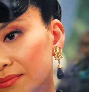 Katie Leung appears to be wearing a flesh-colored bandaid on her ear in one of her scenes