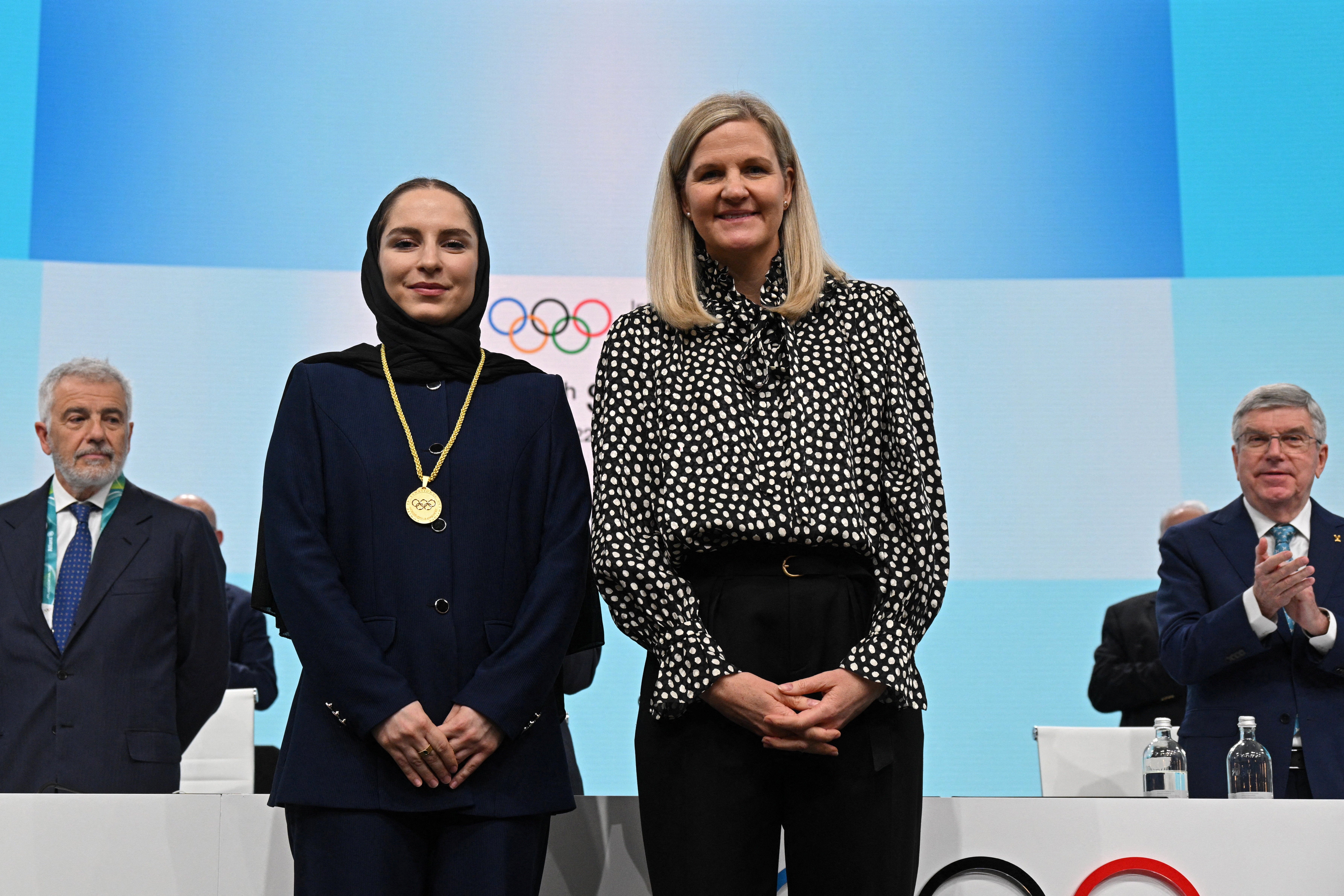 IOC president Kirsty Coventry (right) called on fans to be “respectful” at Winter Olympics