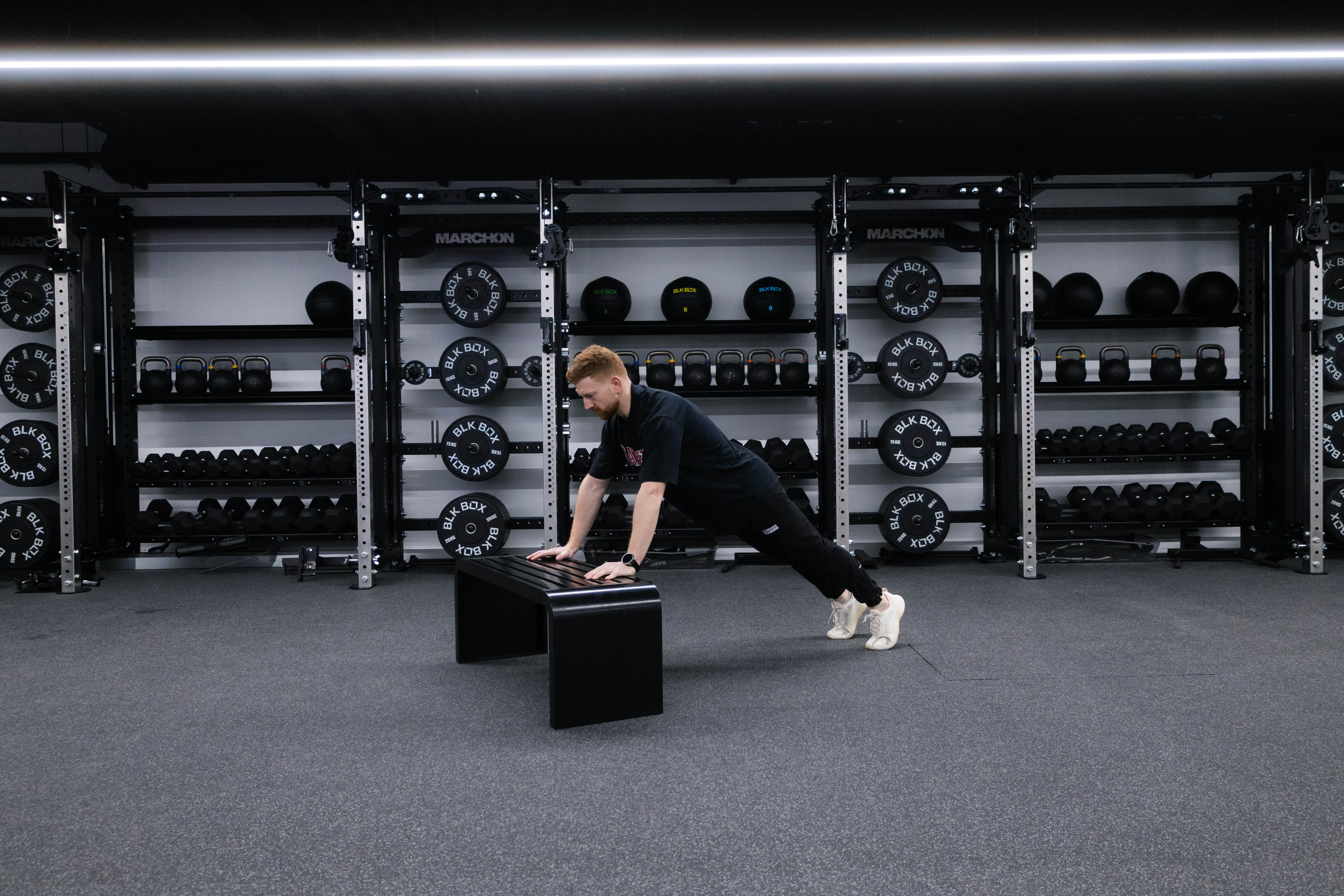 Marchon coach Patrick James demonstrating a hands-elevated press-up