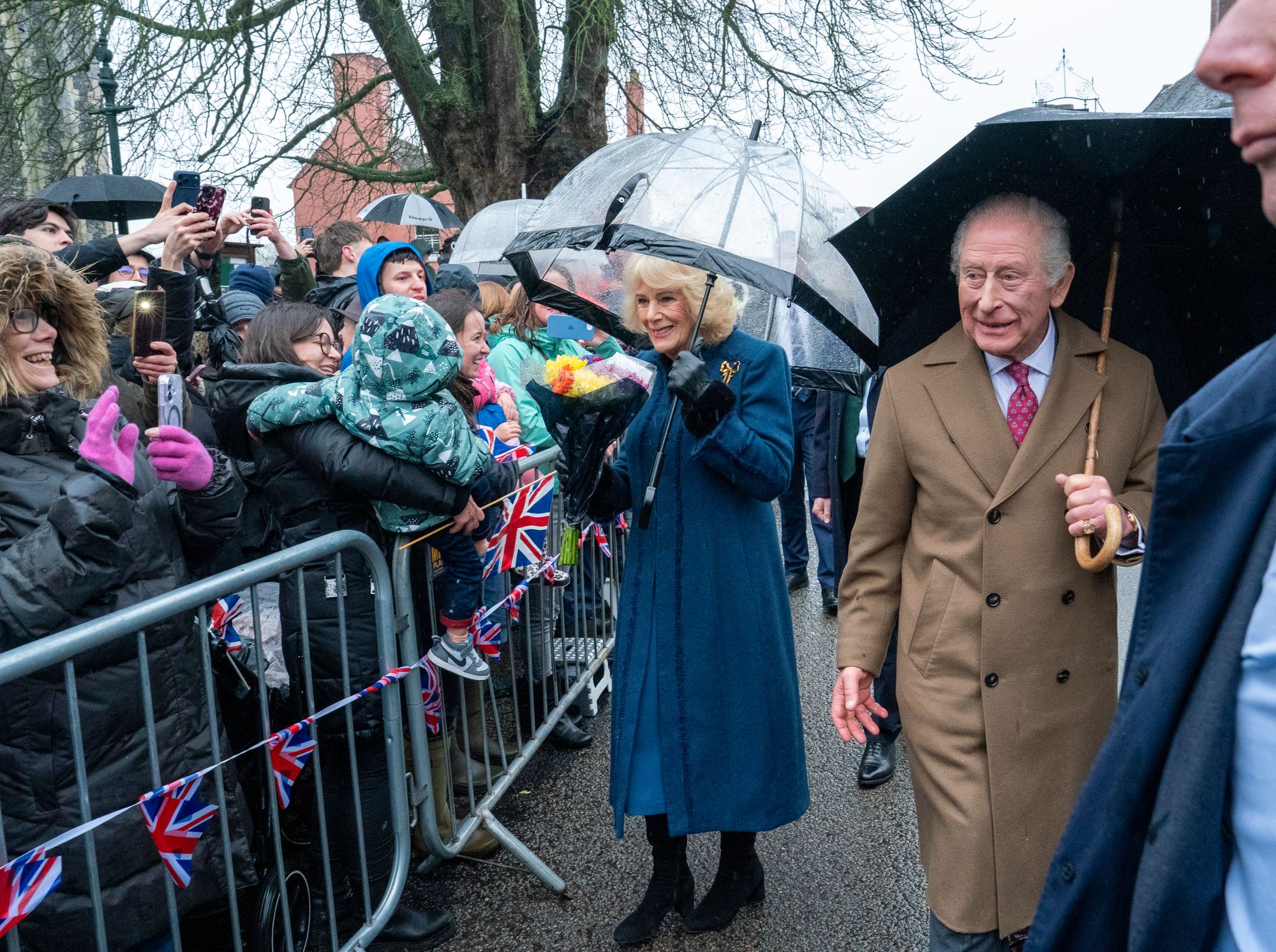 King Charles and Queen Camilla were moved to the other side of the road