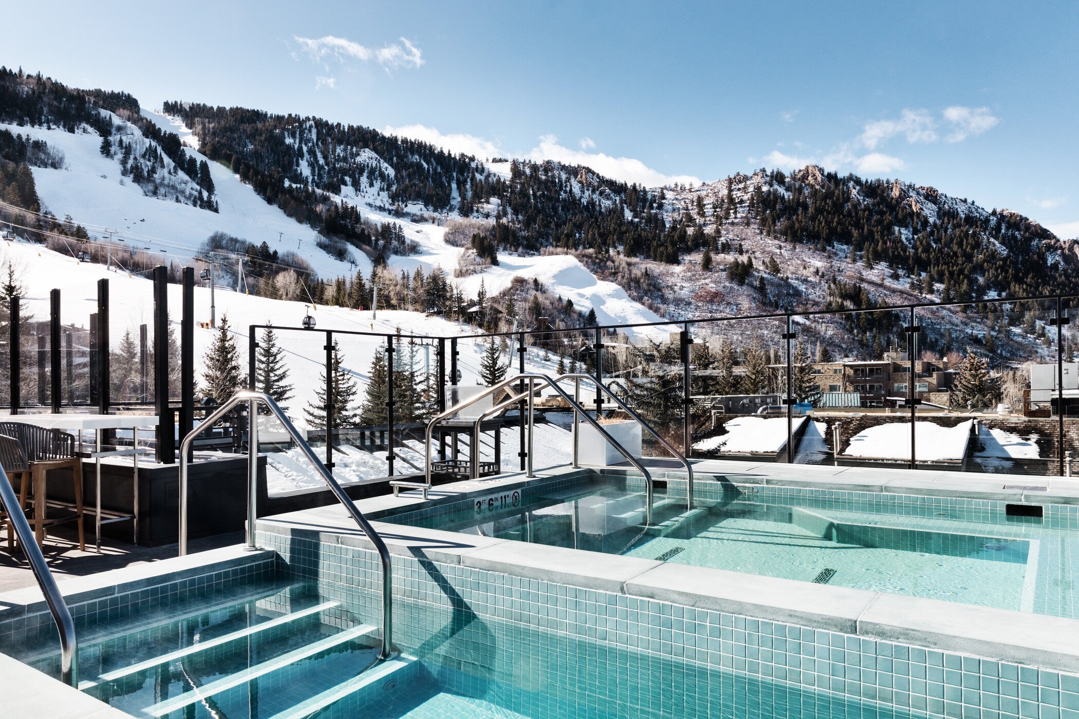 W Aspen has a rooftop pool and hot tub, as well as lively spots for sipping apres cocktails
