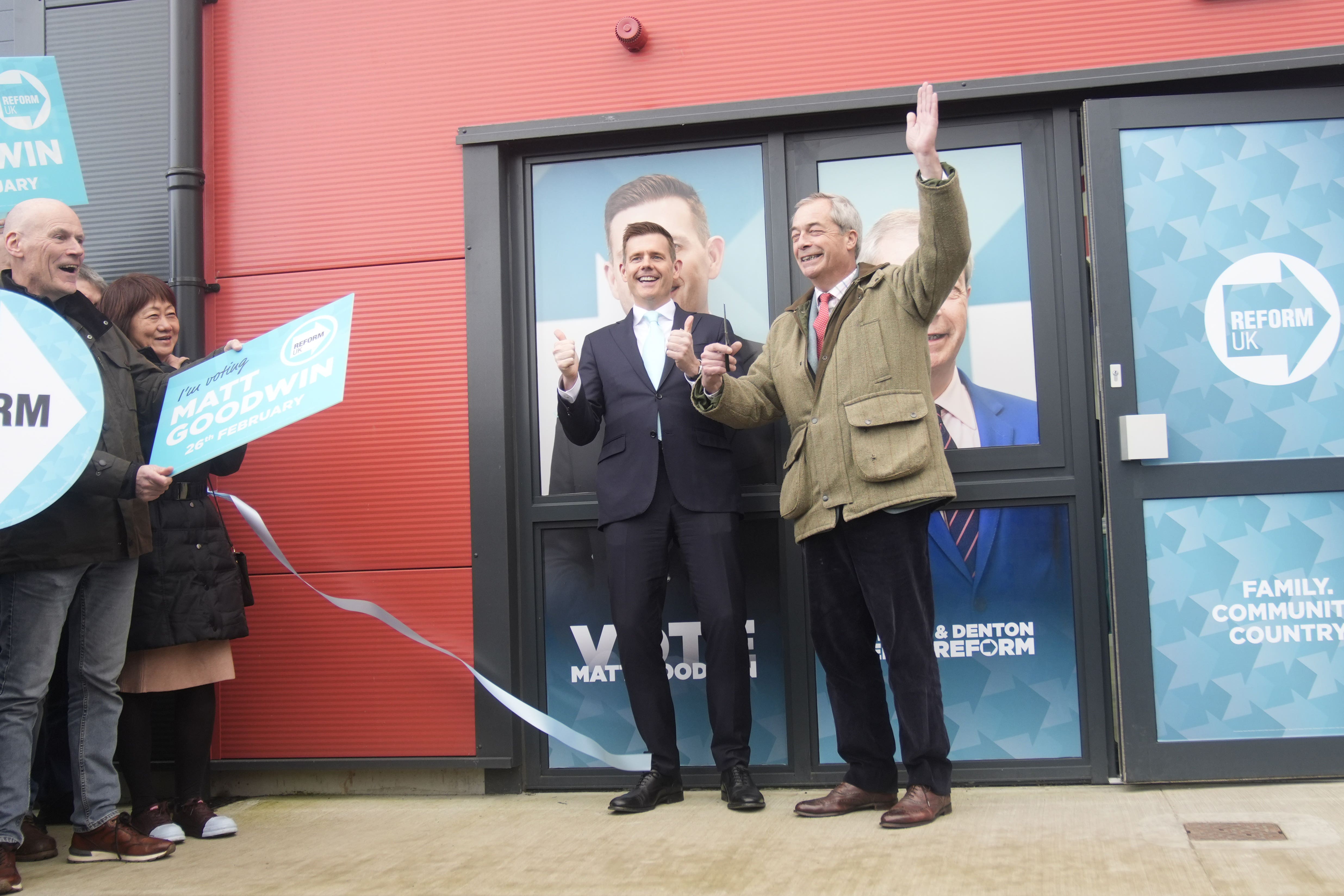 Reform UK leader Nigel Farage and Reform UK’s Gorton and Denton by-election candidate Matt Goodwin open their campaign headquarters in Denton (Danny Lawson/PA)