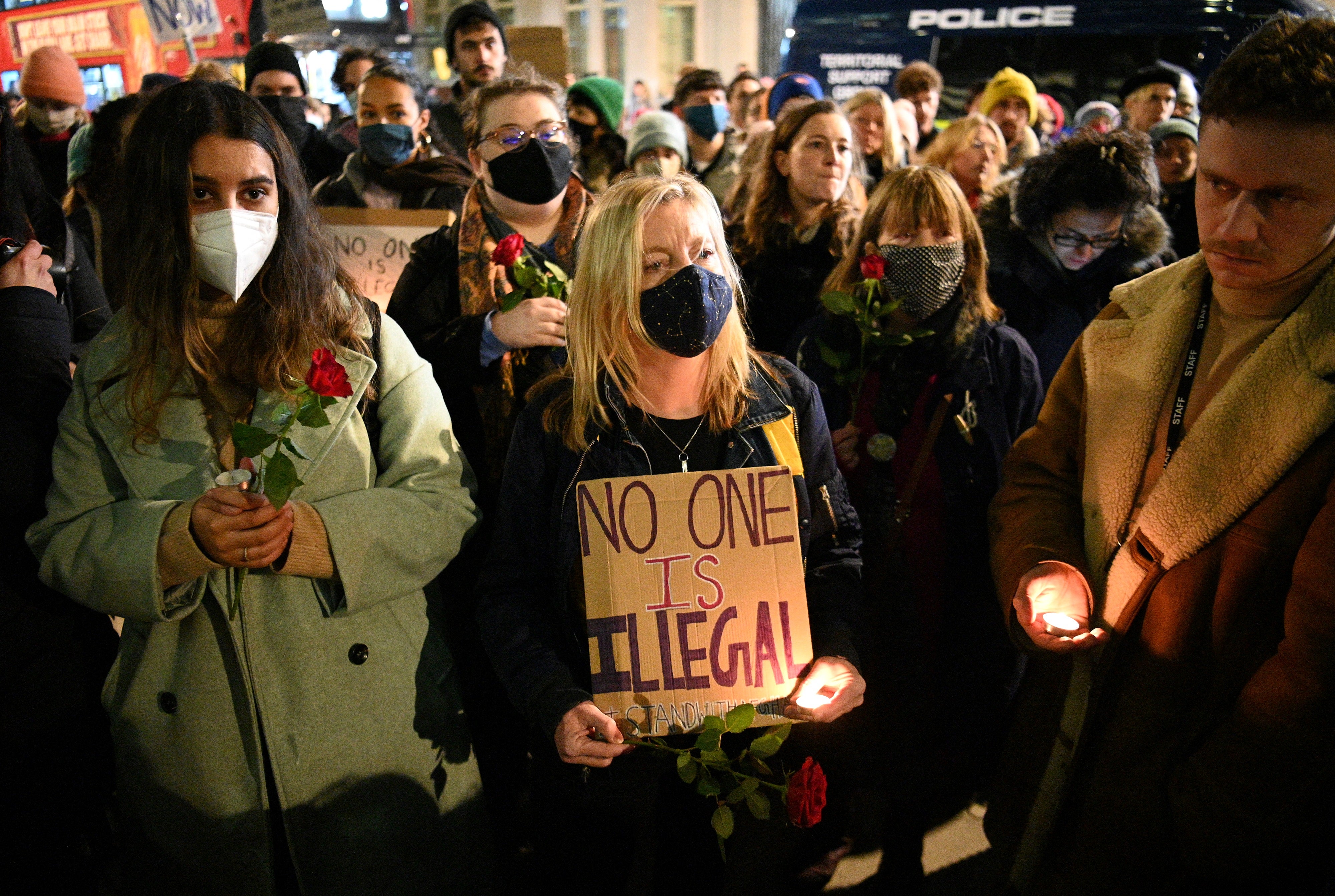 Protestors demonstrate against the British Government's policy on immigration and border controls, outside of the Home Office in central London on November 25, 2021, following the death of 27 migrants crossing the English channel.
