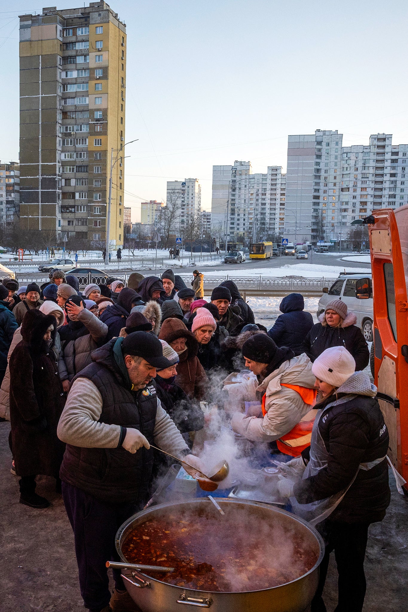 World Central Kitchen staff hand out free soup in a Kyiv neighbourhood that has faced electricity and heating outages following recent Russian attacks