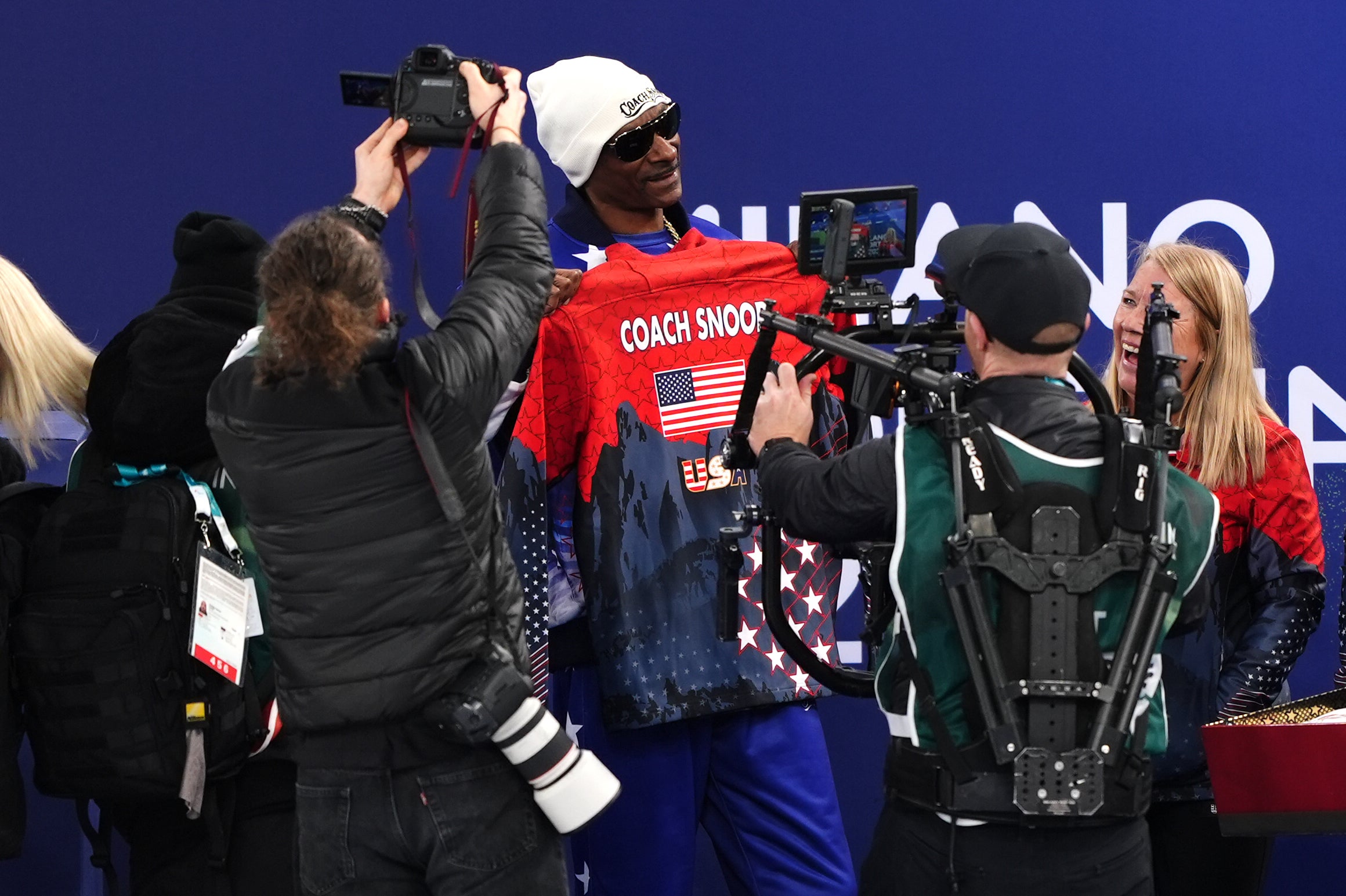 American rapper Snoop Dogg is presented with a custom USA jacket at in Cortina (Andrew Milligan/PA)