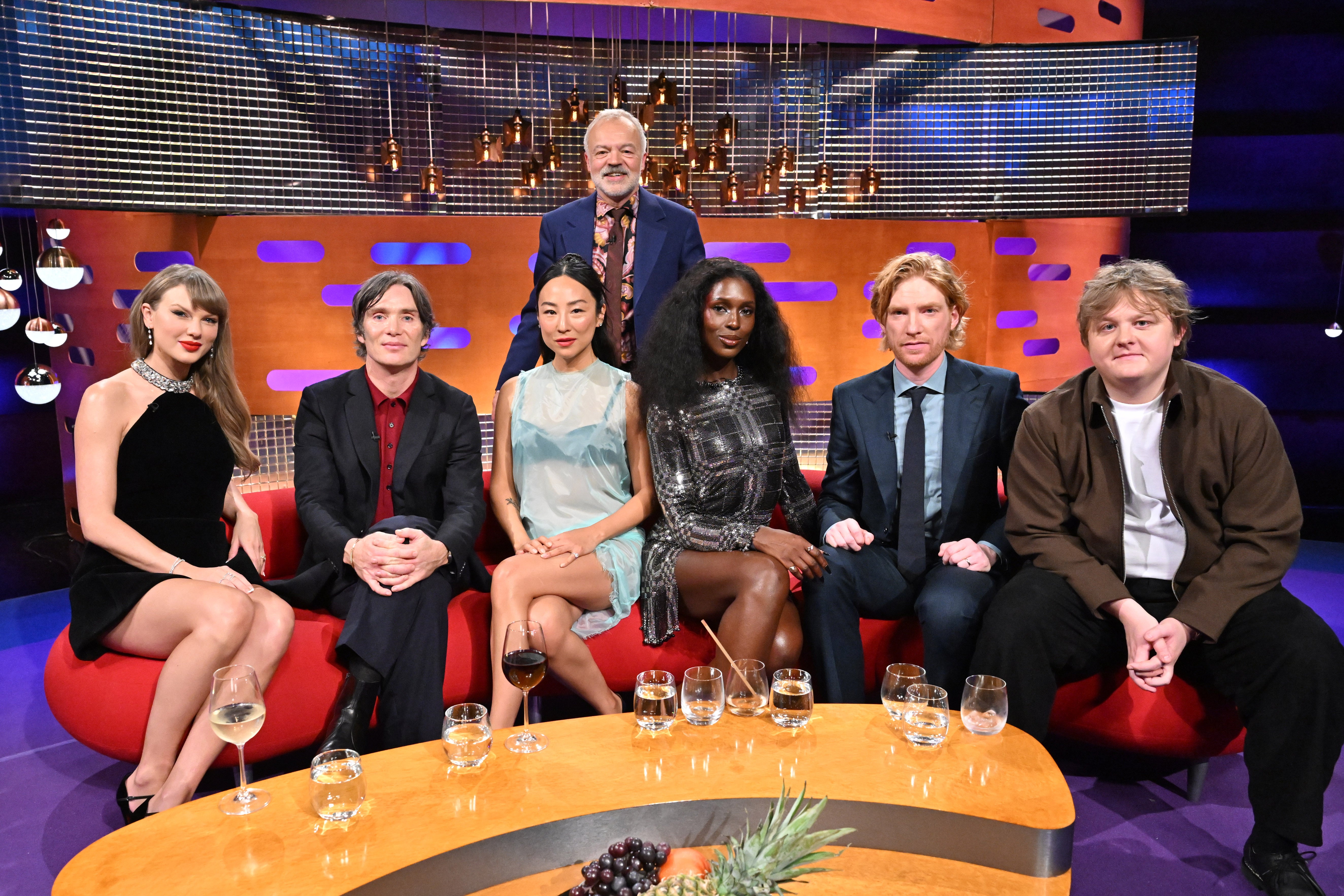 <p>From left, Taylor Swift, Cillian Murphy, Greta Lee, Jodie Turner-Smith, Domhnall Gleeson and Lewis Capaldi with host Graham Norton during filming in October 2025 (Matt Crossick/PA Media Assignments/PA)</p>