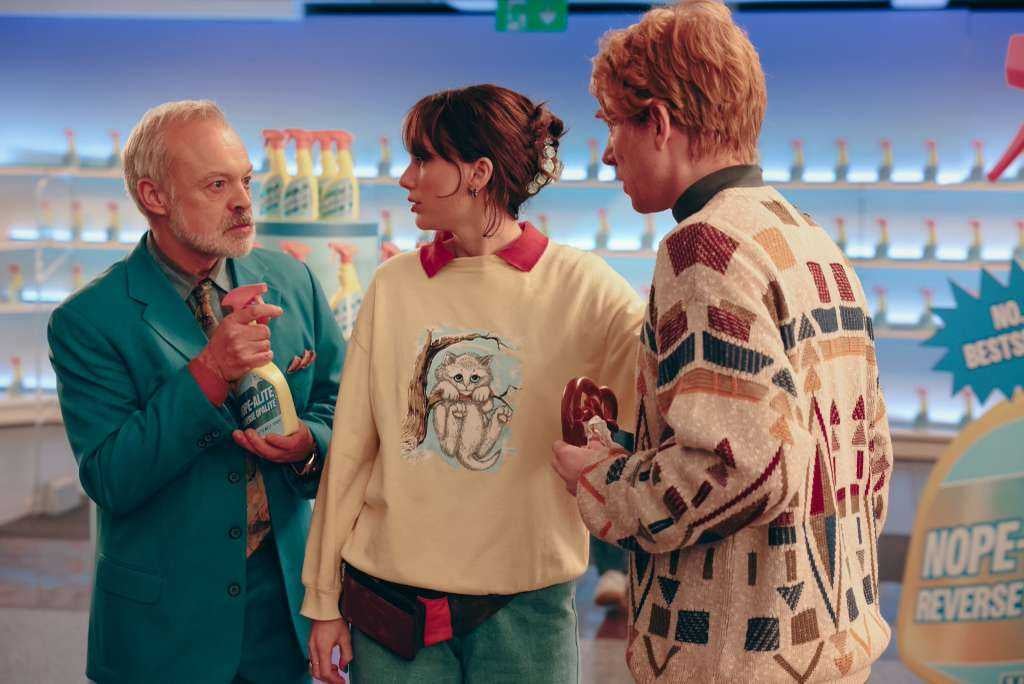 <p>Graham Norton, Taylor Swift and Domhnall Gleeson in the ‘Opalite’ music video</p>