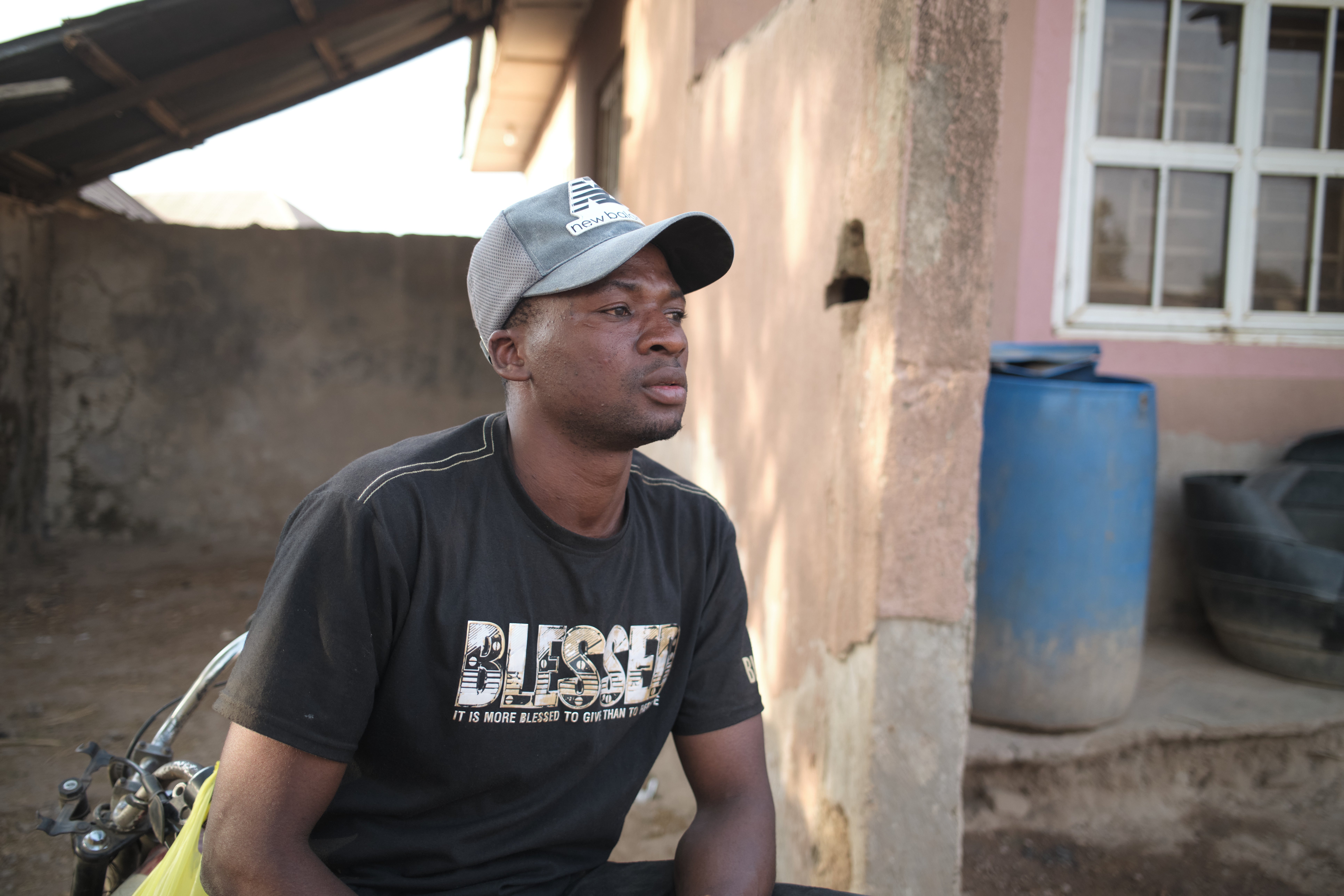 Umar Bio Kabir, a 26-year-old schoolteacher who survived by running when the attackers arrived in the village.