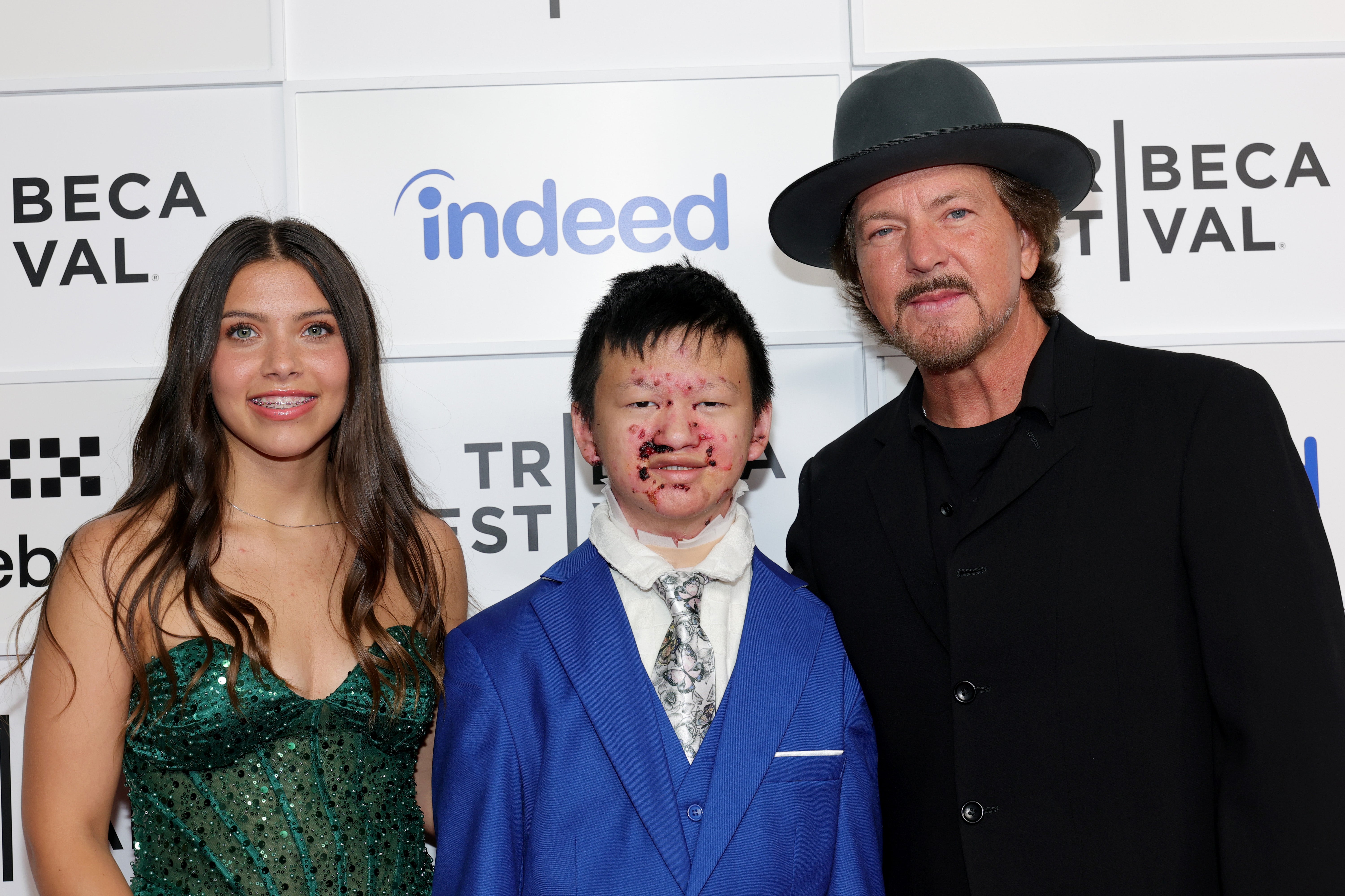 Epidermolysis Bullosa activist Lily Meyer, her brother Eli Meyer, who was born with EB, and Eddie Vedder at the ‘Matter Of Time’ premiere