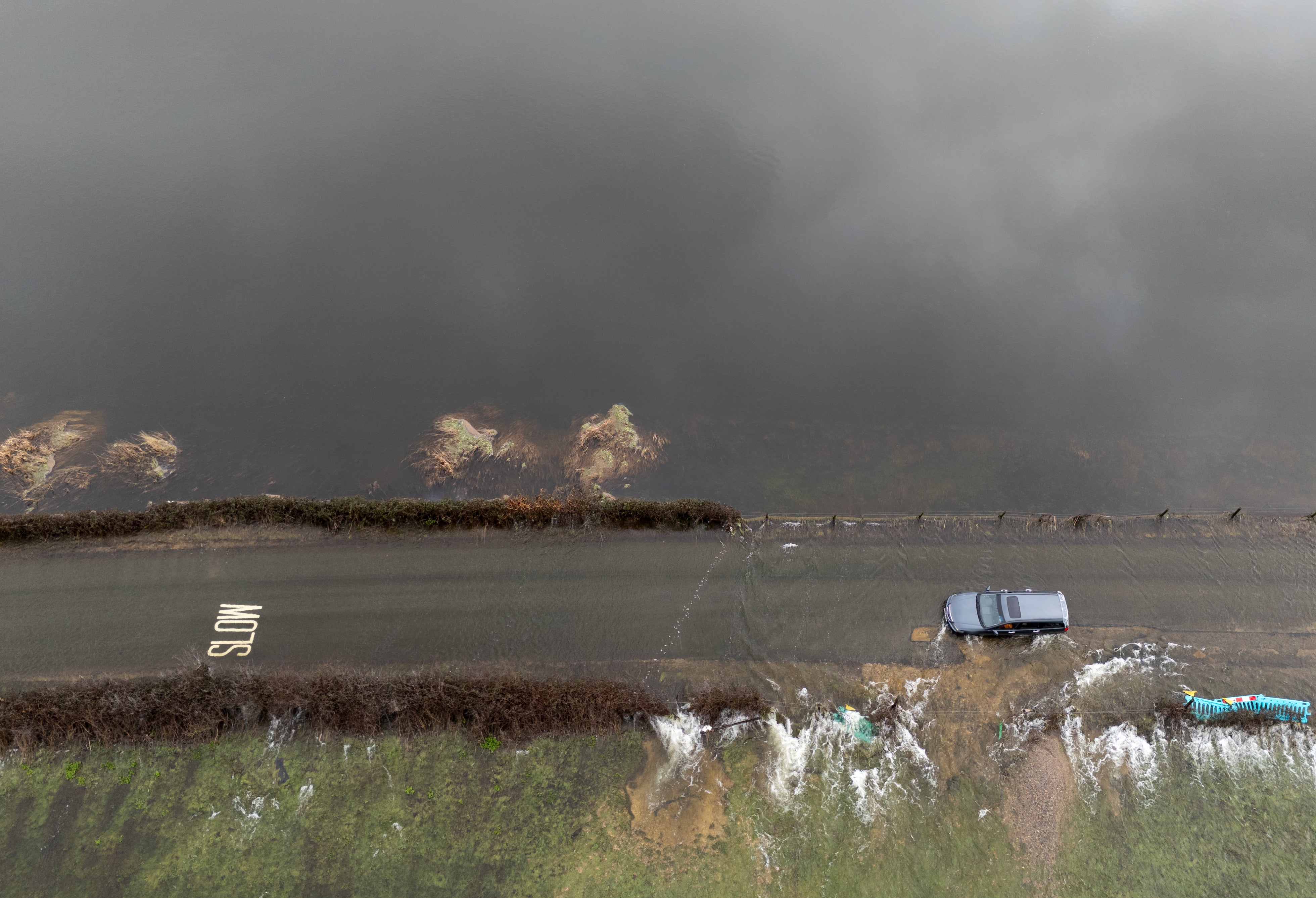 Flood waters cover a road near Harbridge, Hampshire (Andrew Matthews/PA)