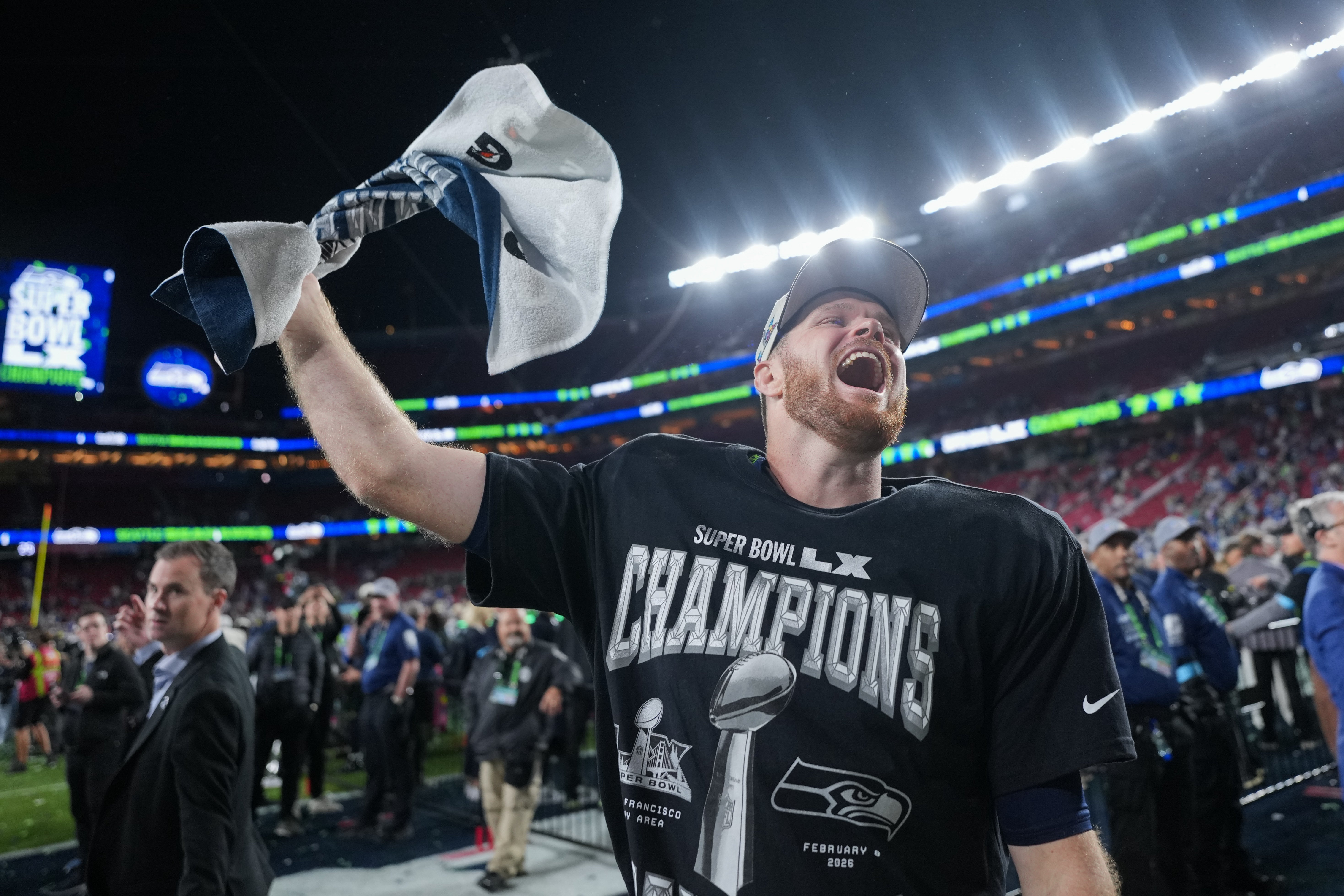 Seattle Seahawks quarterback Sam Darnold celebrates after a win over the New England Patriots in the NFL Super Bowl