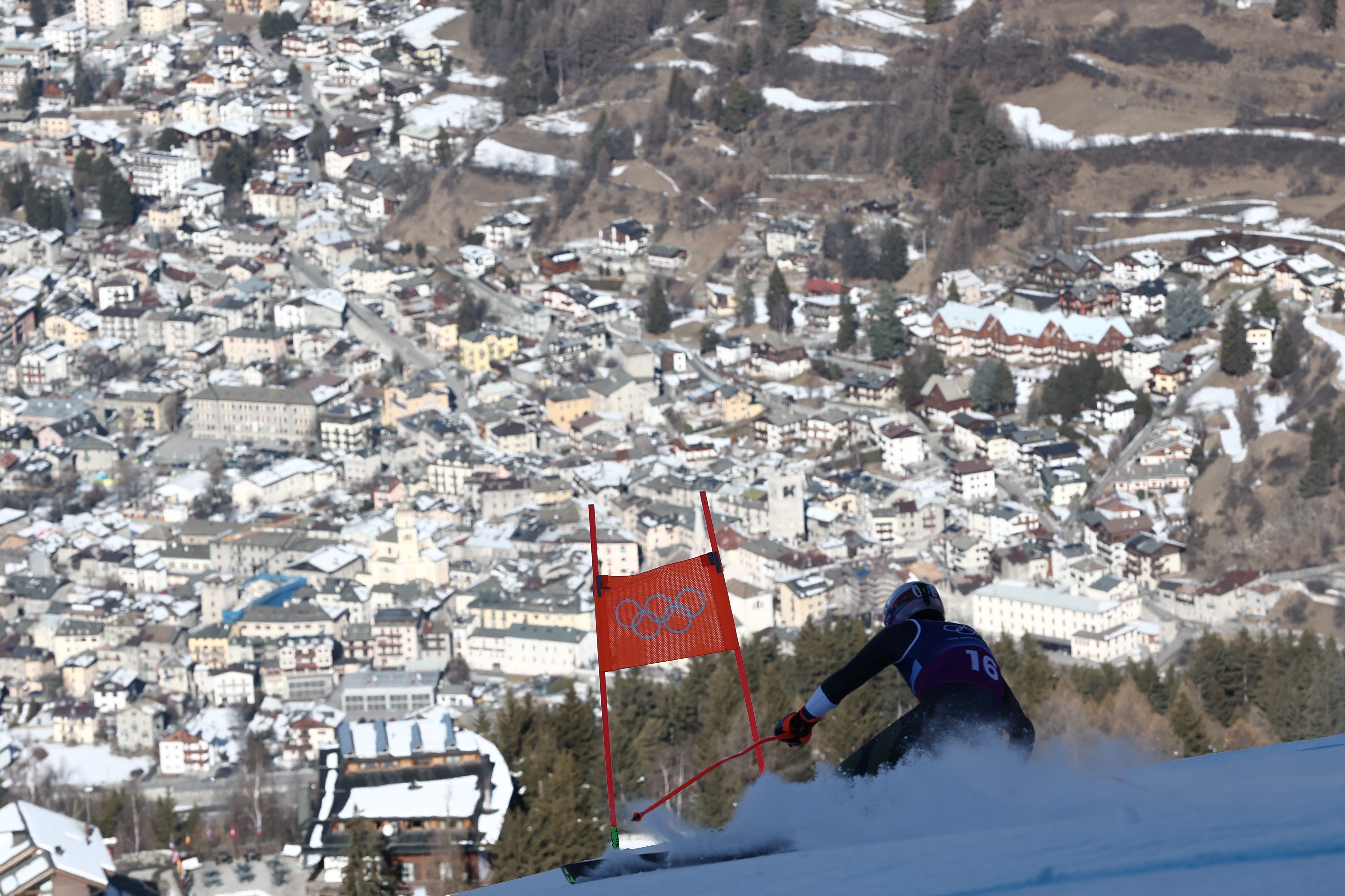 Finland's Elian Lehto speeds down the course of an alpine ski men's downhill portion of a team combined race, at the 2026 Winter Olympics, in Bormio, Italy