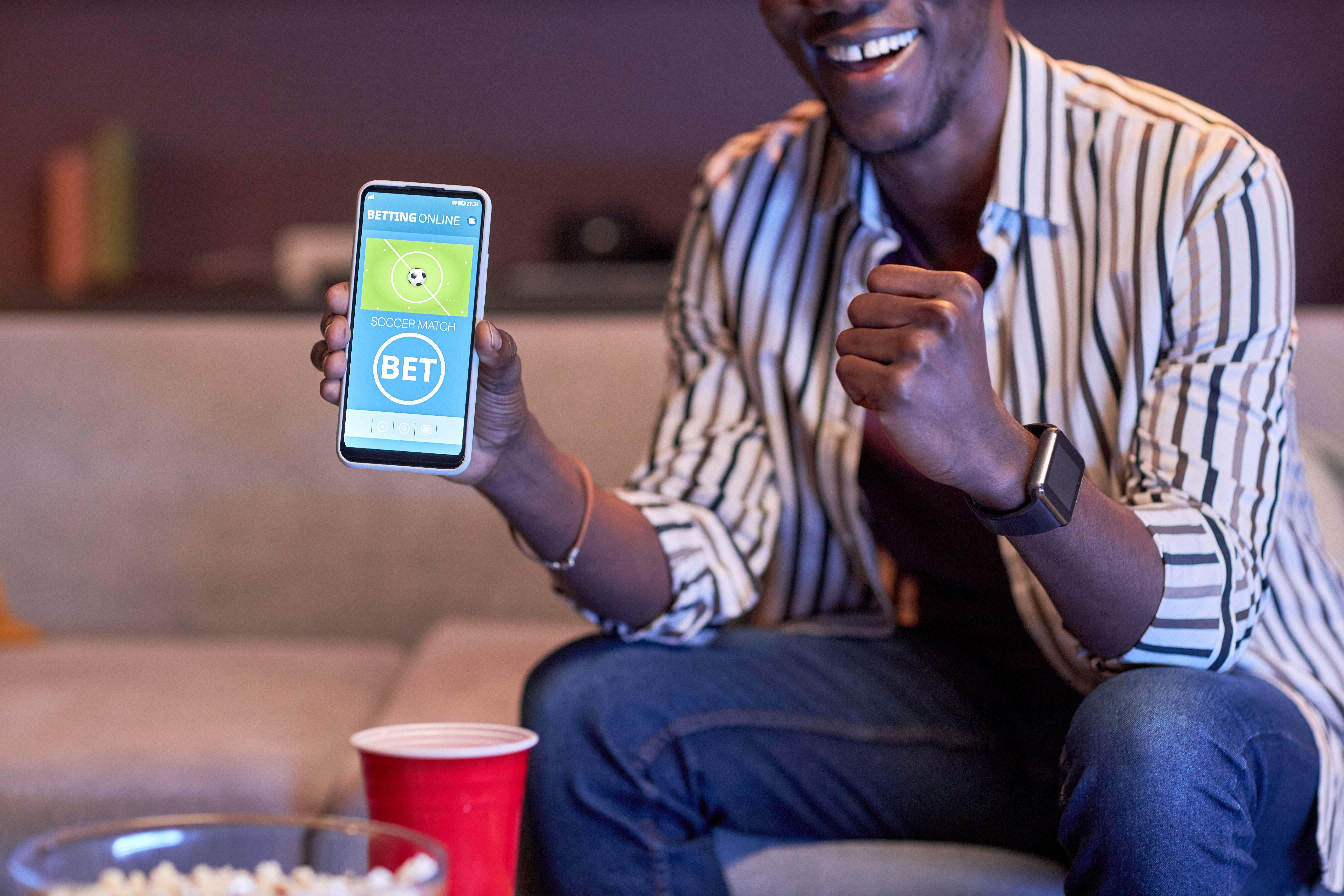 There are some key signs that might indicate that casual bets on sports games has spiralled into something more serious (Alamy/PA)