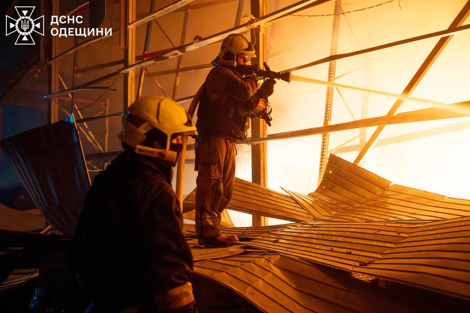 In this photo provided by the Ukrainian Emergency Service, emergency services personnel work to extinguish a fire following a Russian attack in Odesa region, Ukraine, Thursday, Jan. 29, 2026