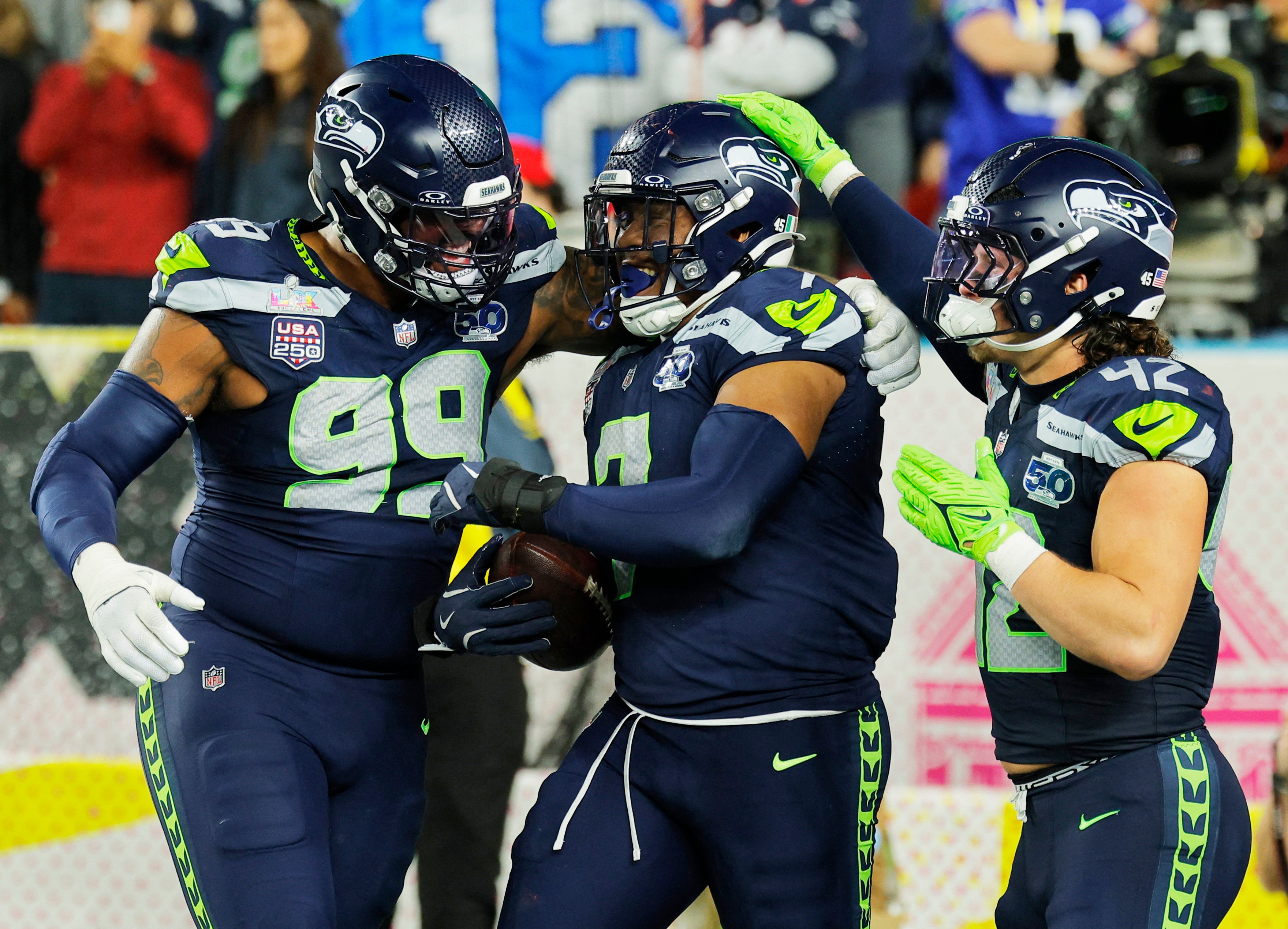 Seattle Seahawks' Uchenna Nwosu celebrates scoring