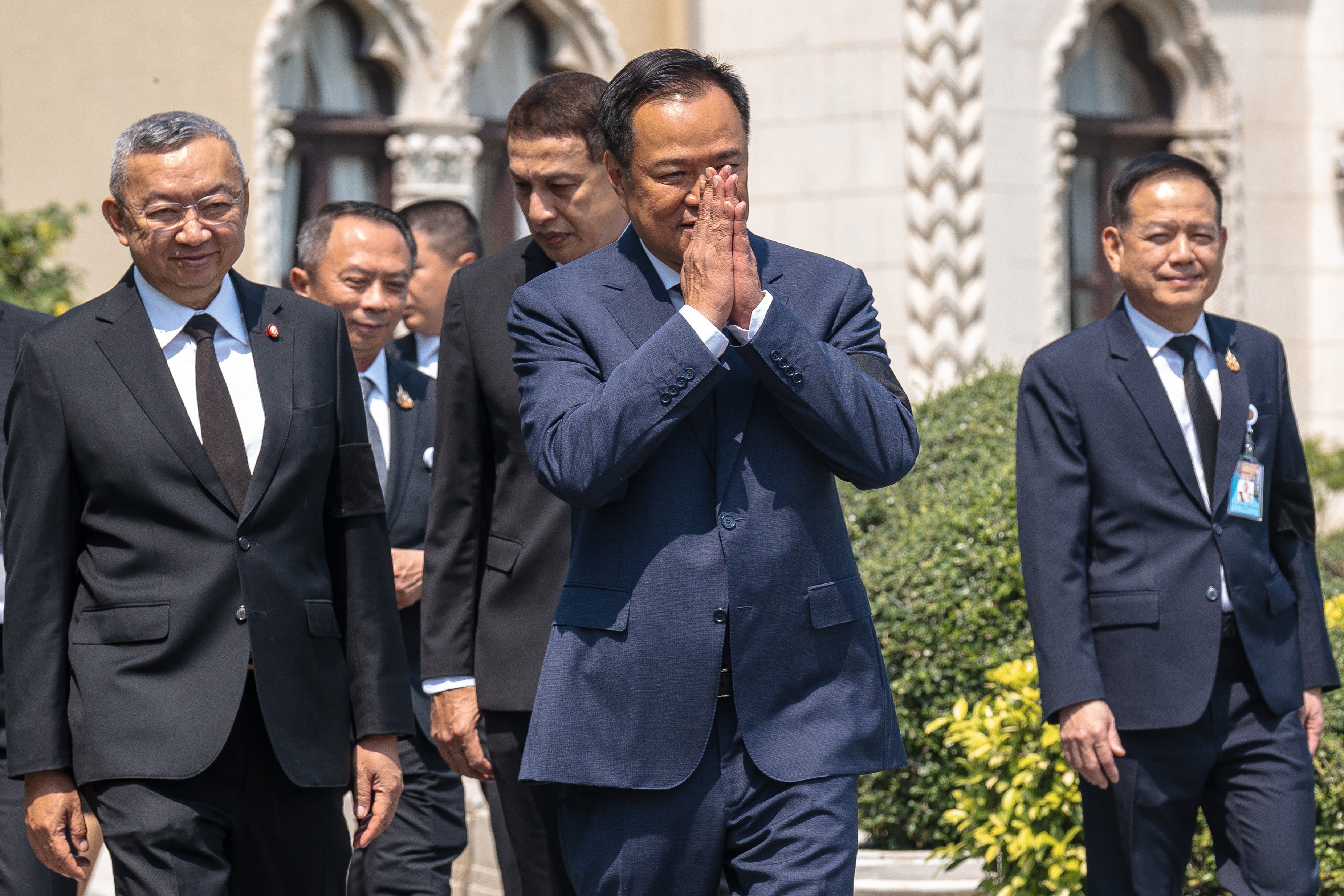 Thai prime minister Anutin Charnvirakul gestures as he arrives at the Government House in Bangkok on 9 February 2026
