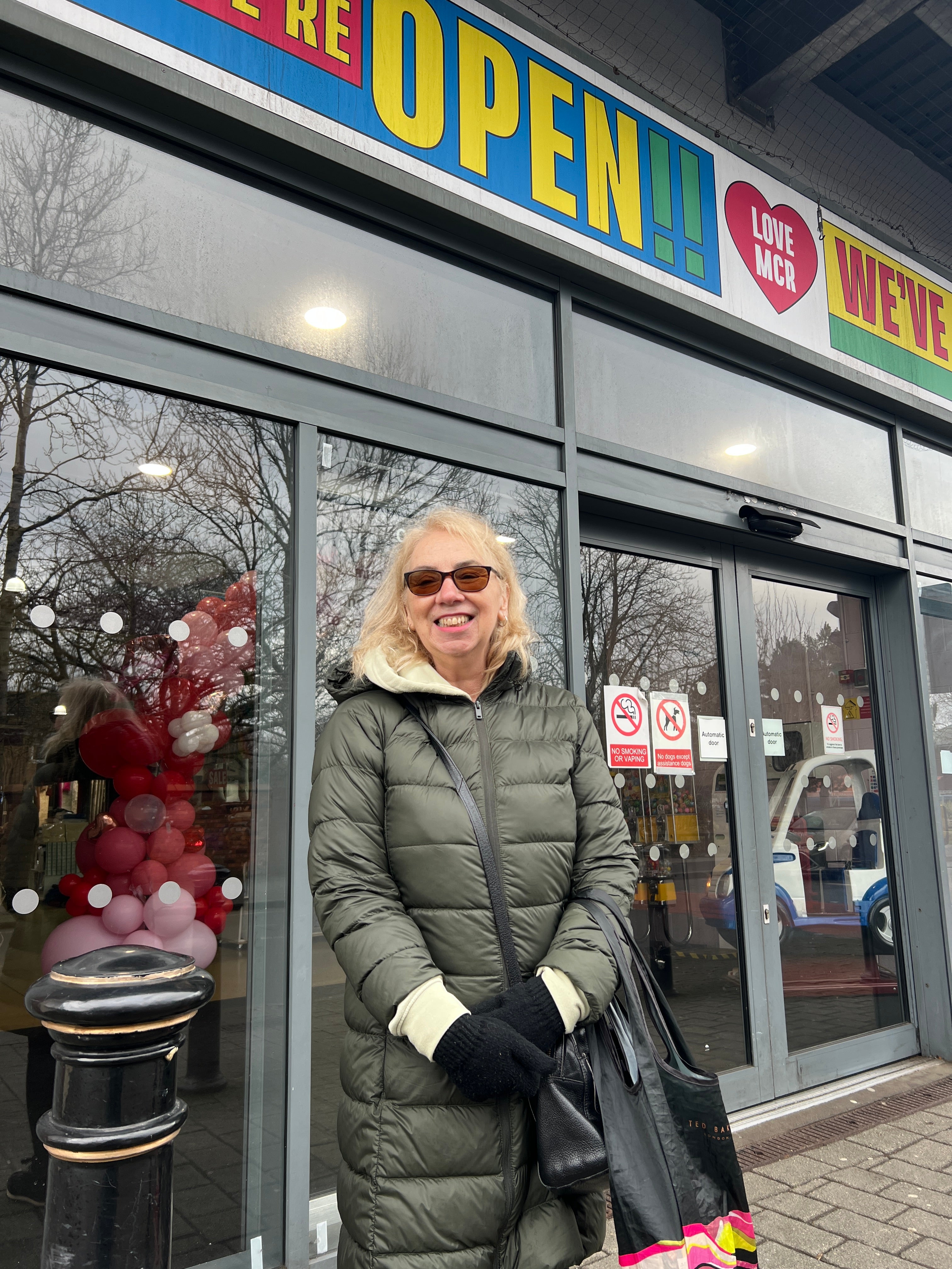Caterina Pandolfo, standing outside Gorton market, says she feels alienated from the political class