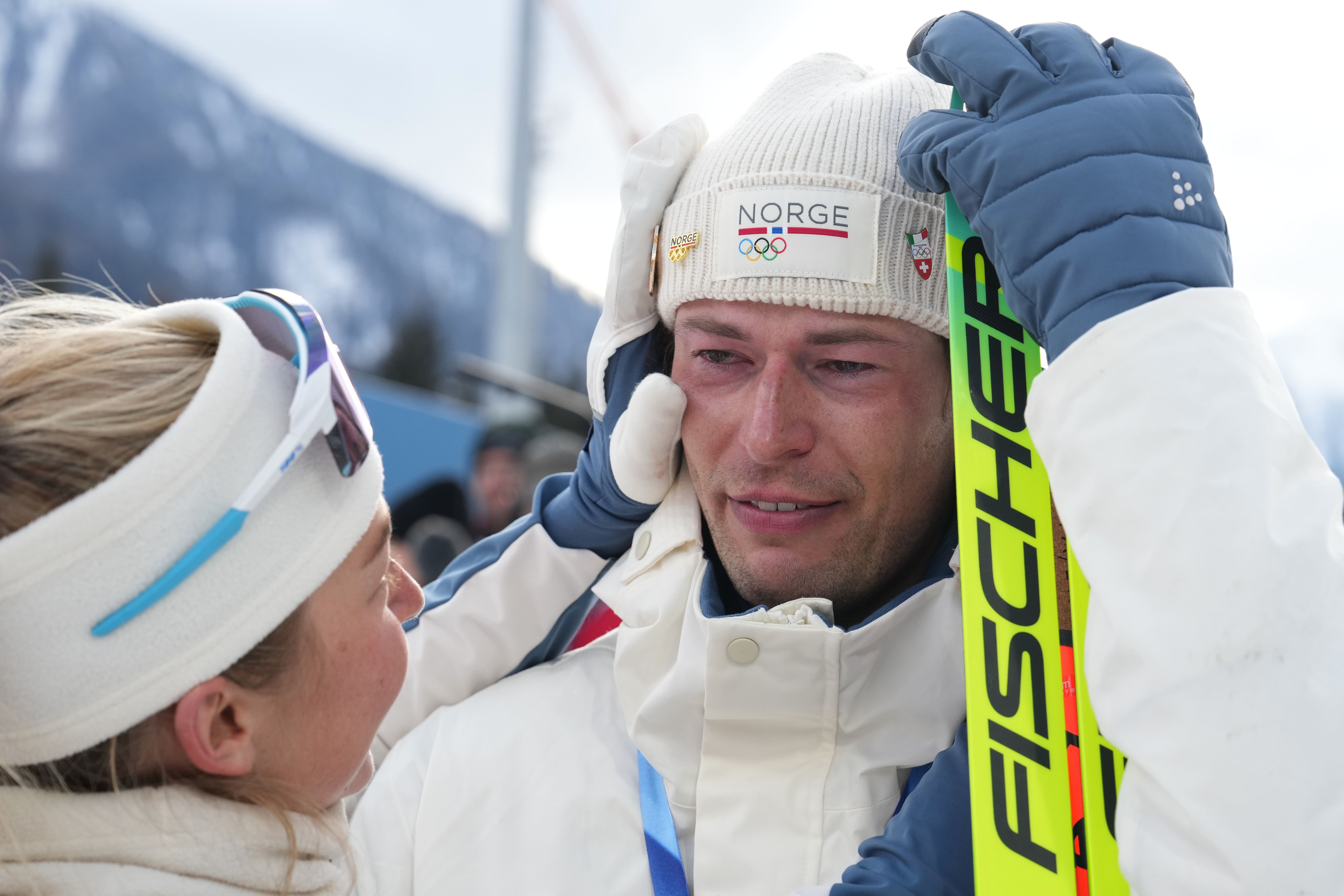 Sturla Holm Laegreid, of Norway, reacts after he won bronze in the men’s 20-kilometer individual biathlon race at the 2026 Winter Olympics in Anterselva, Italy, Tuesday, Feb. 10, 2026. (AP Photo/Andrew Medichini)