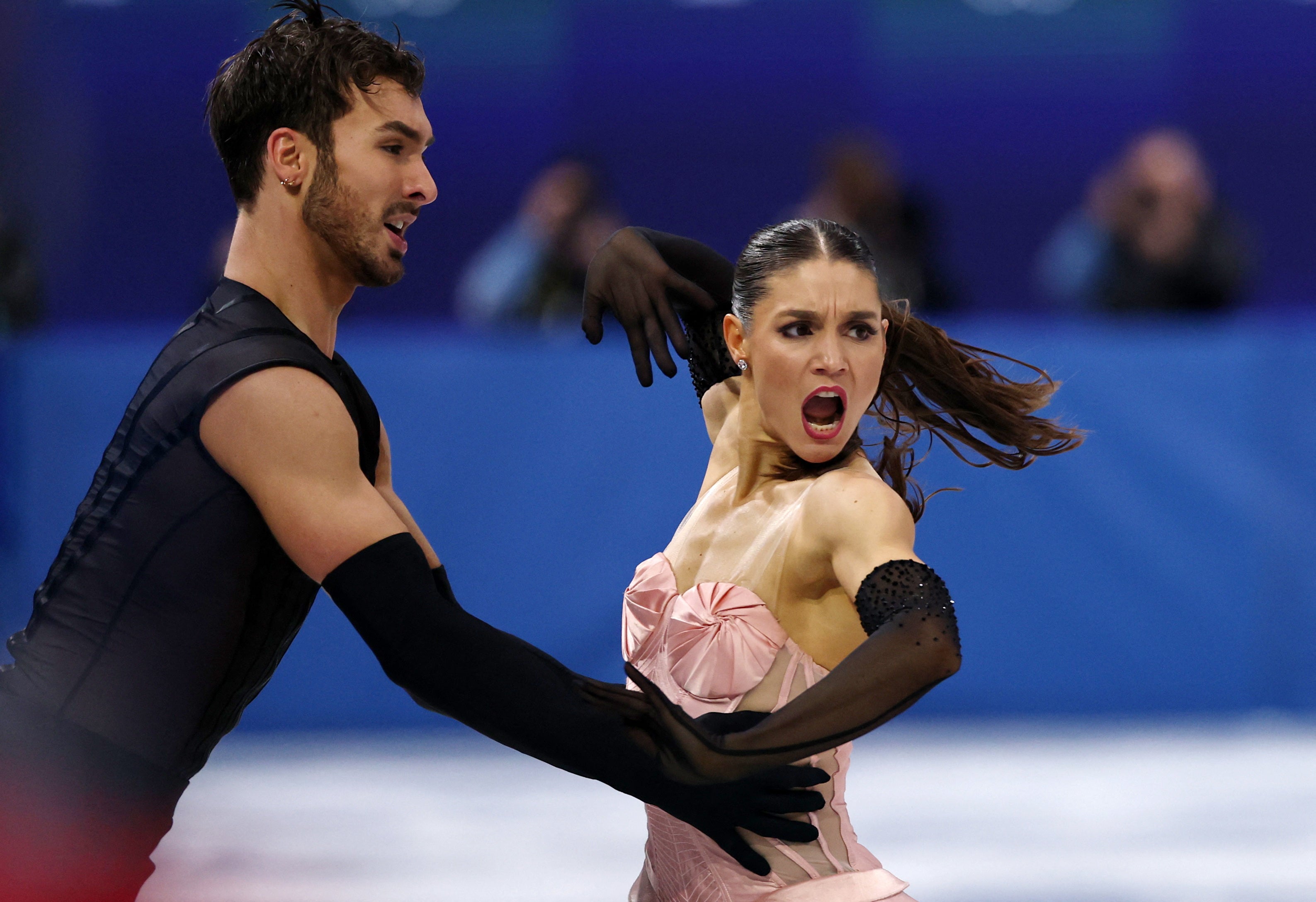 Laurence Fournier Beaudry and Guillaume Cizeron of France perform during the rhythm dance