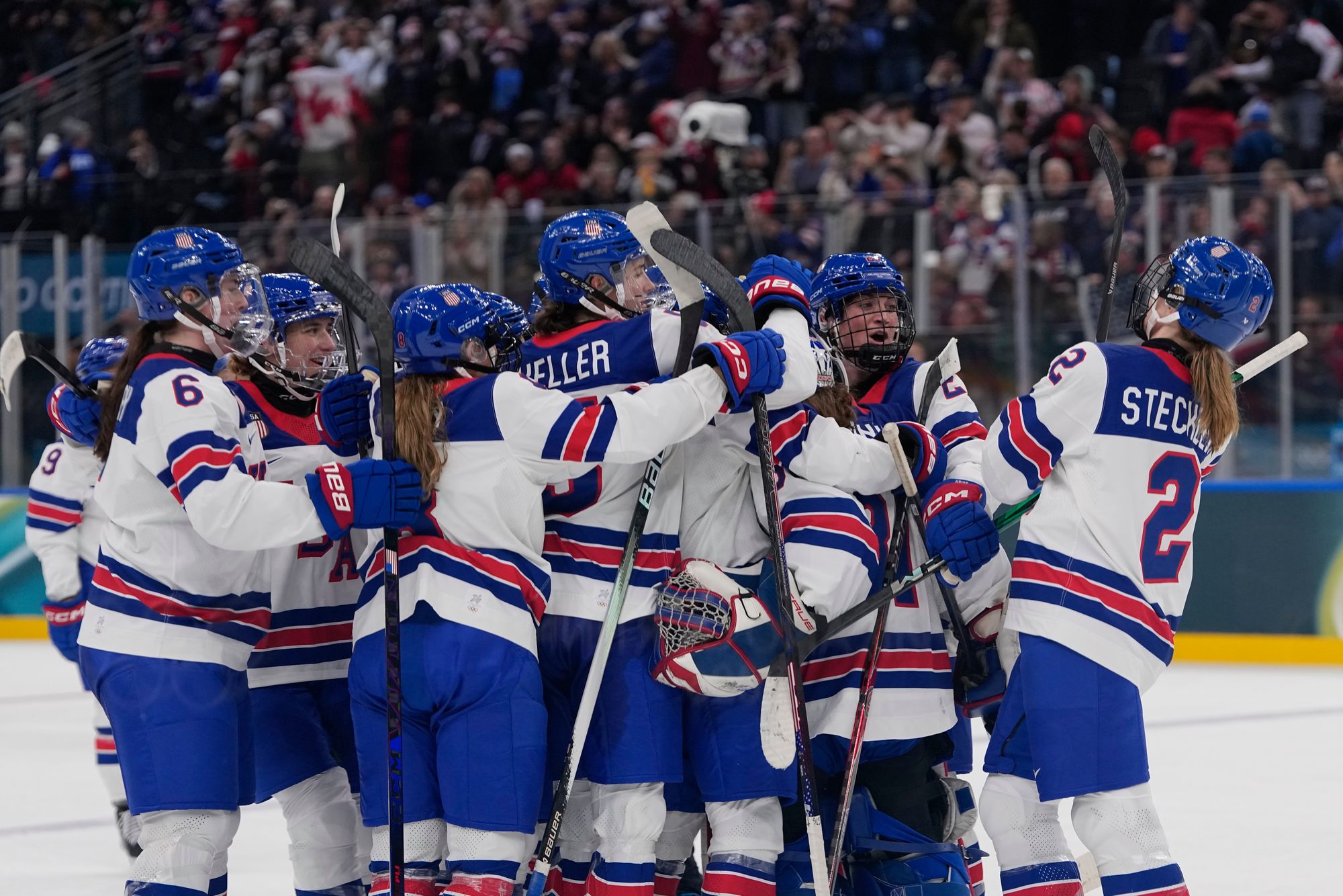 US players celebrate their victory over rivals Canada