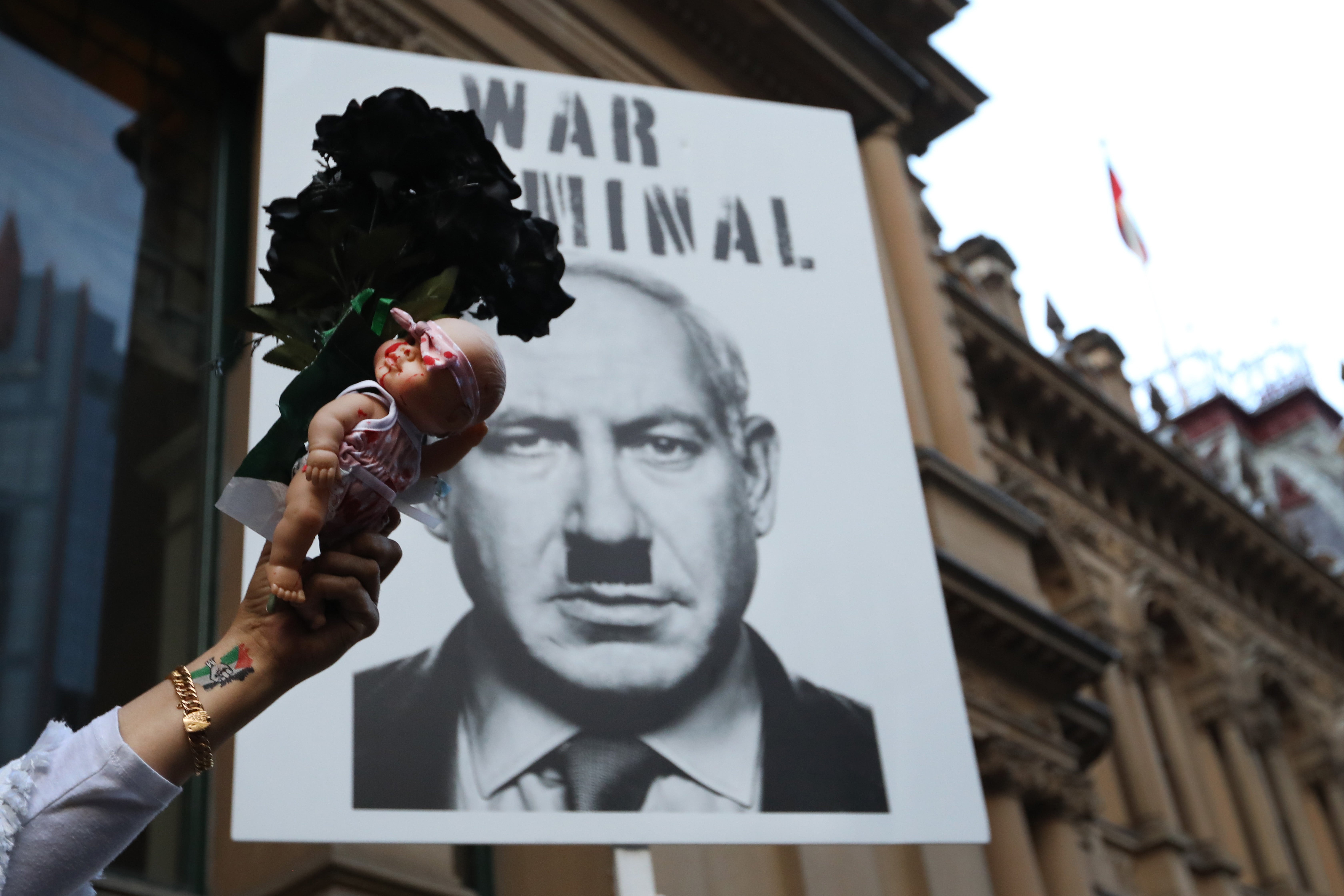 Many protesters have accused Herzog of committing war crimes in Gaza