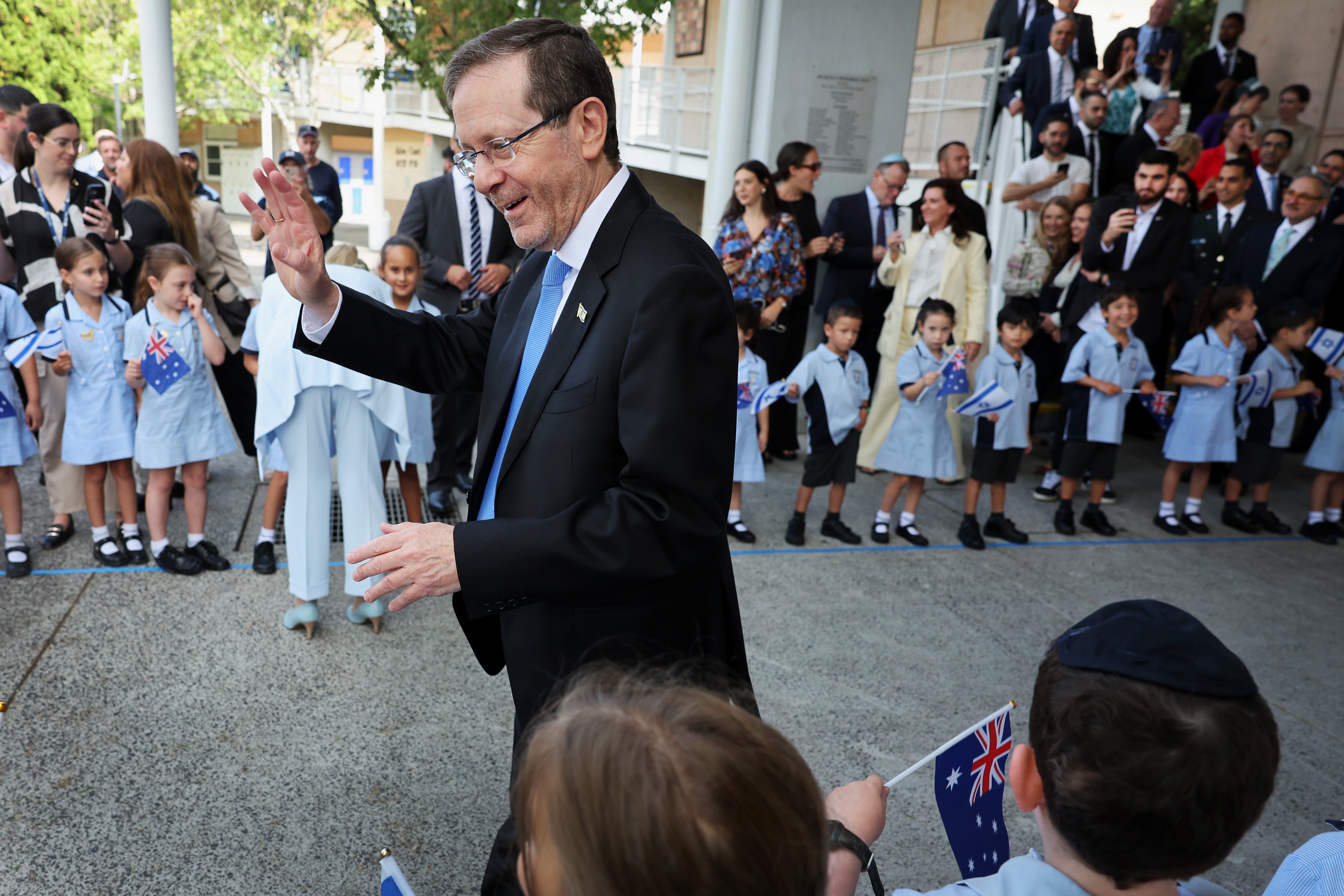 Herzog meets with students during a visit to Moriah War Memorial College on Tuesday
