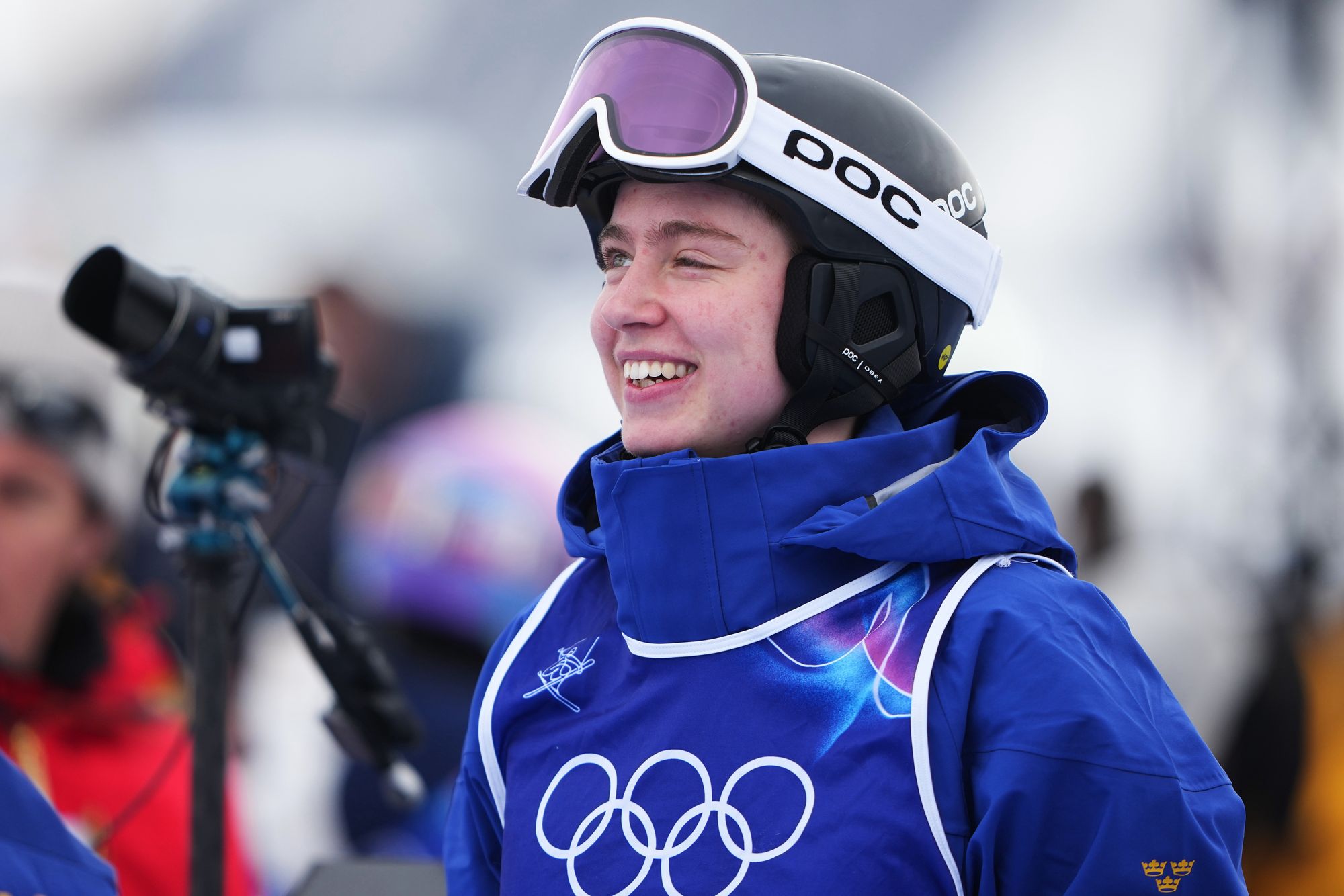 Sweden's Elis Lundholm look on before the women's freestyle skiing moguls qualifications