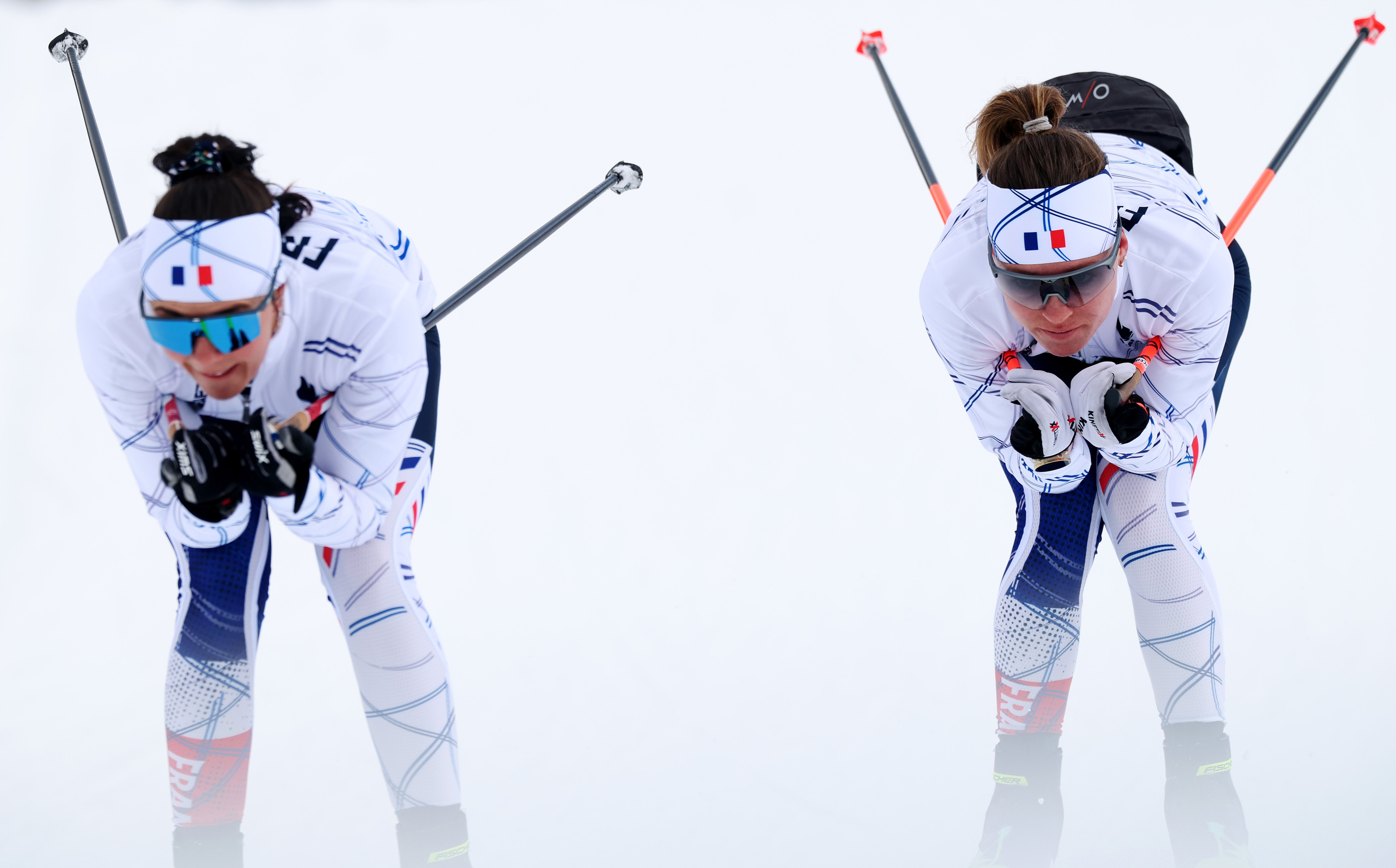Oceane Michelon of Team France in action alongside teammate Lou Jeanmonnot