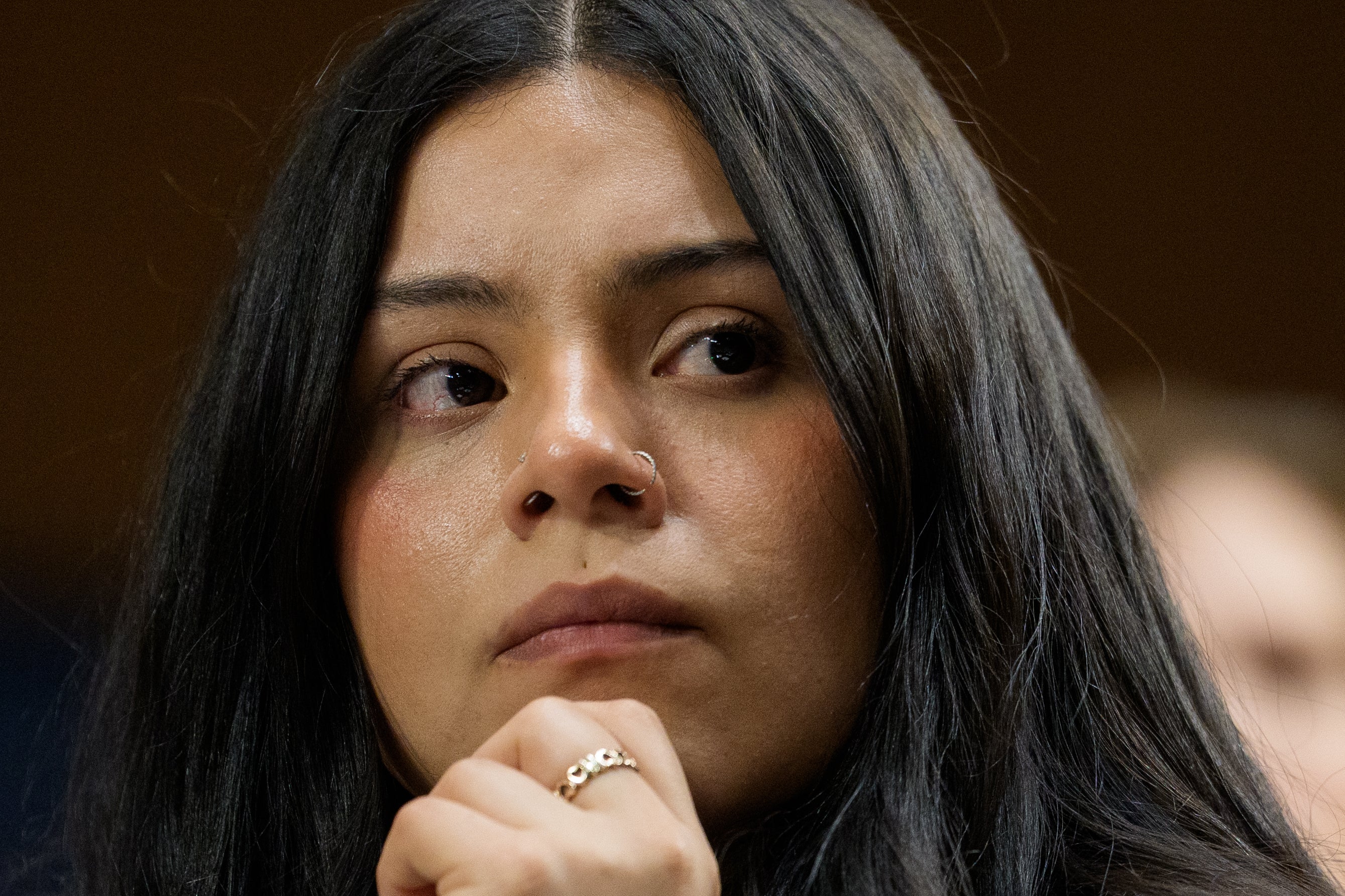 In her testimony to members of Congress, Martinez said she could feel bullets pierce her body as she tried to flee officers who side-swiped her with guns drawn