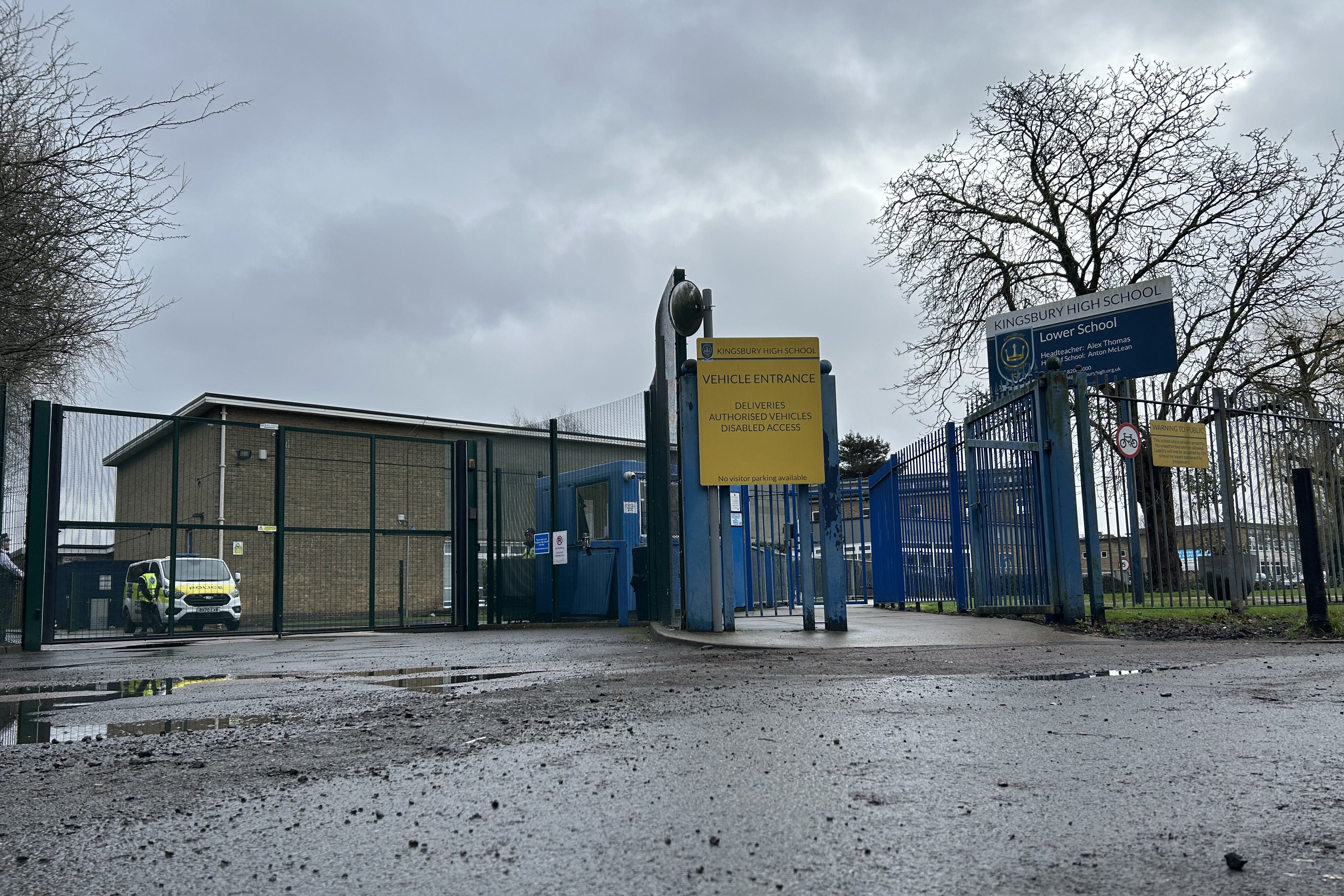 Police officers at the entrance to Kingsbury High School, north west London, where two boys, aged 12 and 13, were stabbed on Tuesday (Oscar Rihil / PA).