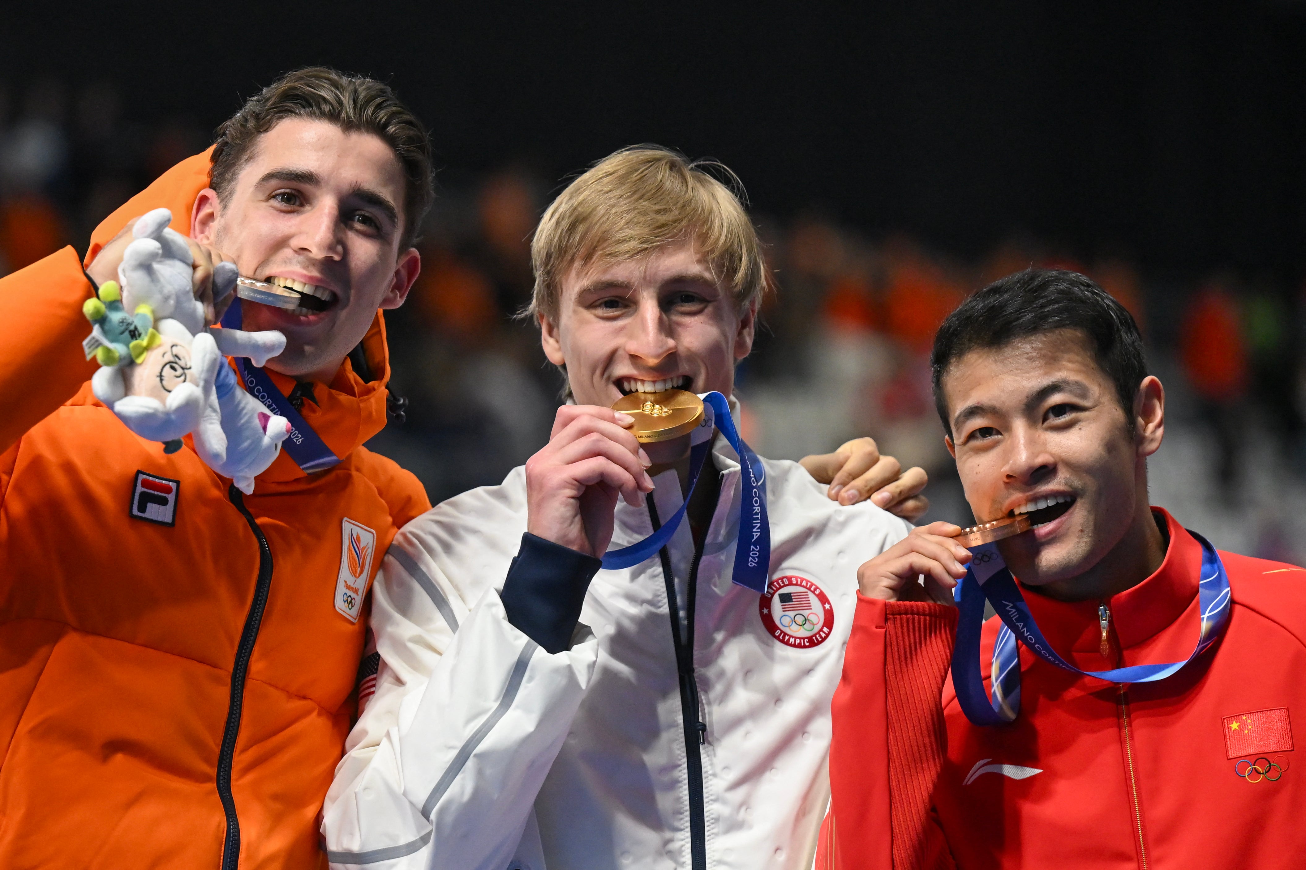 Stolz (centre) claimed his first gold on Wednesday