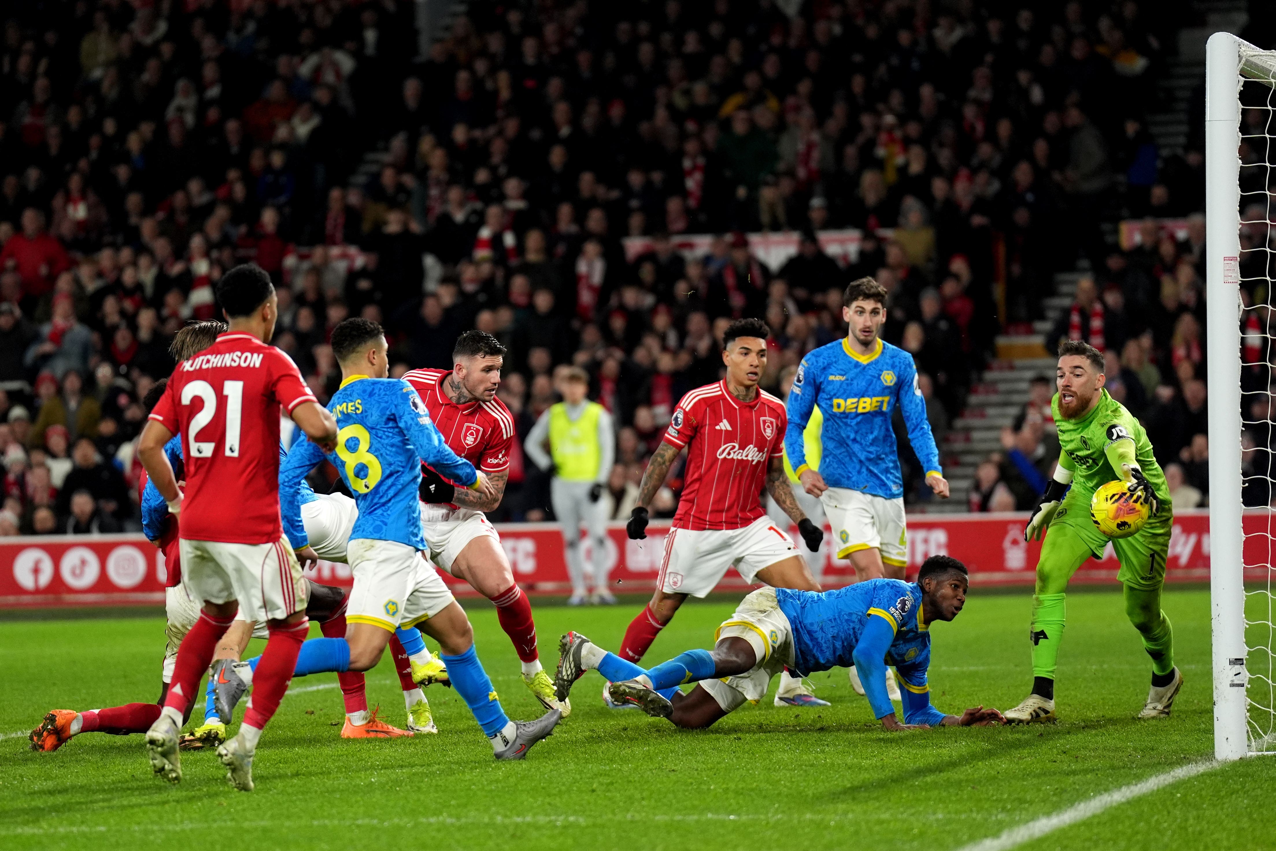 Morato (centre) has a shot saved by Wolves goalkeeper Jose Sa (Joe Giddens/PA)