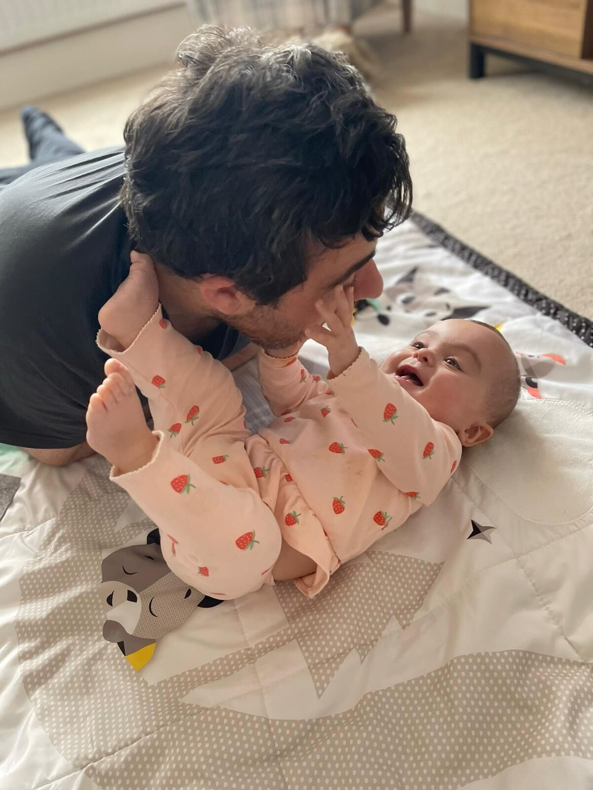 Gigi playing with her father John Meehan shortly before she was killed
