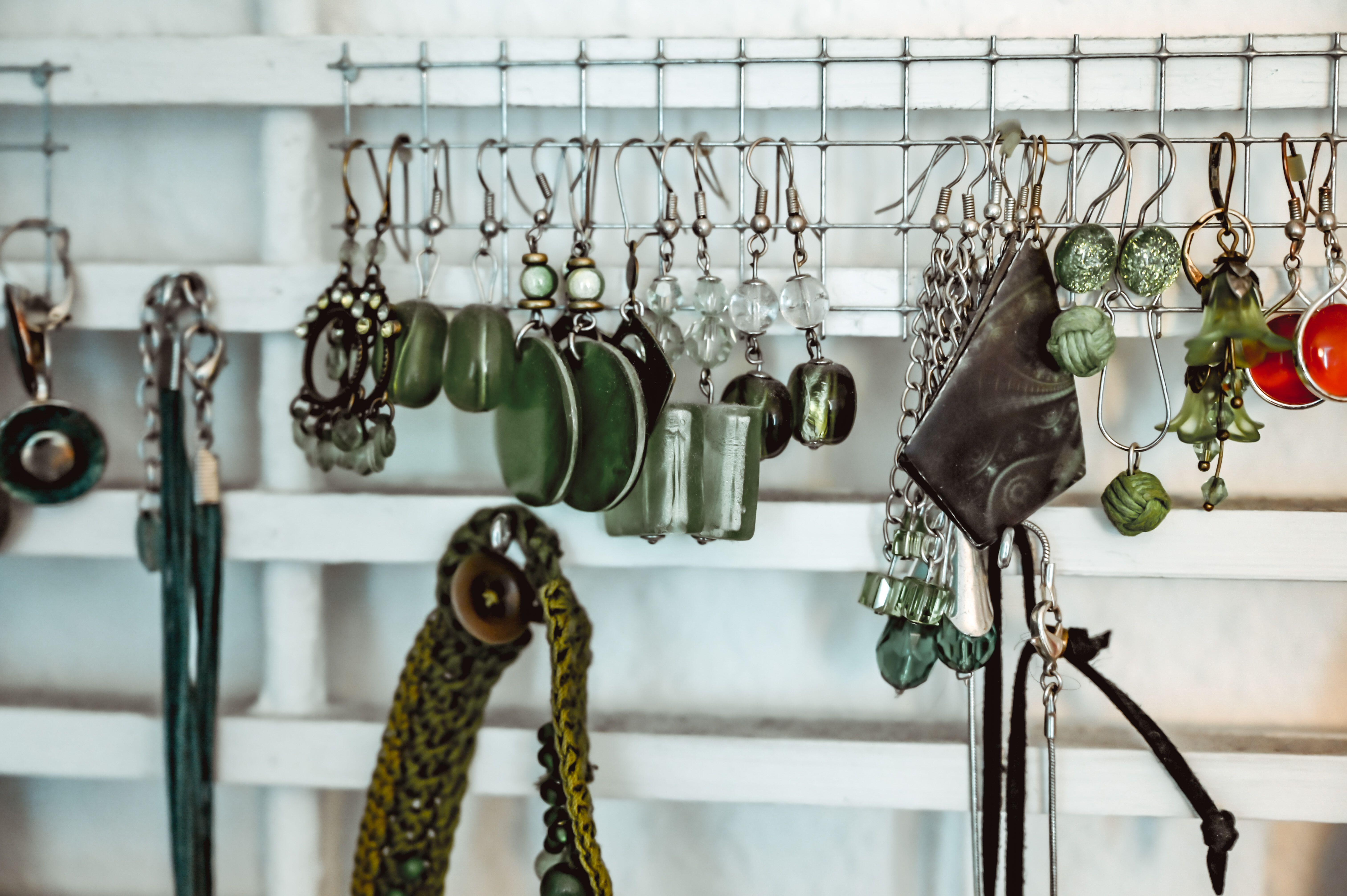 Smoky metal works well with khaki, if you usually opt for silver jewellery (Alamy/PA)