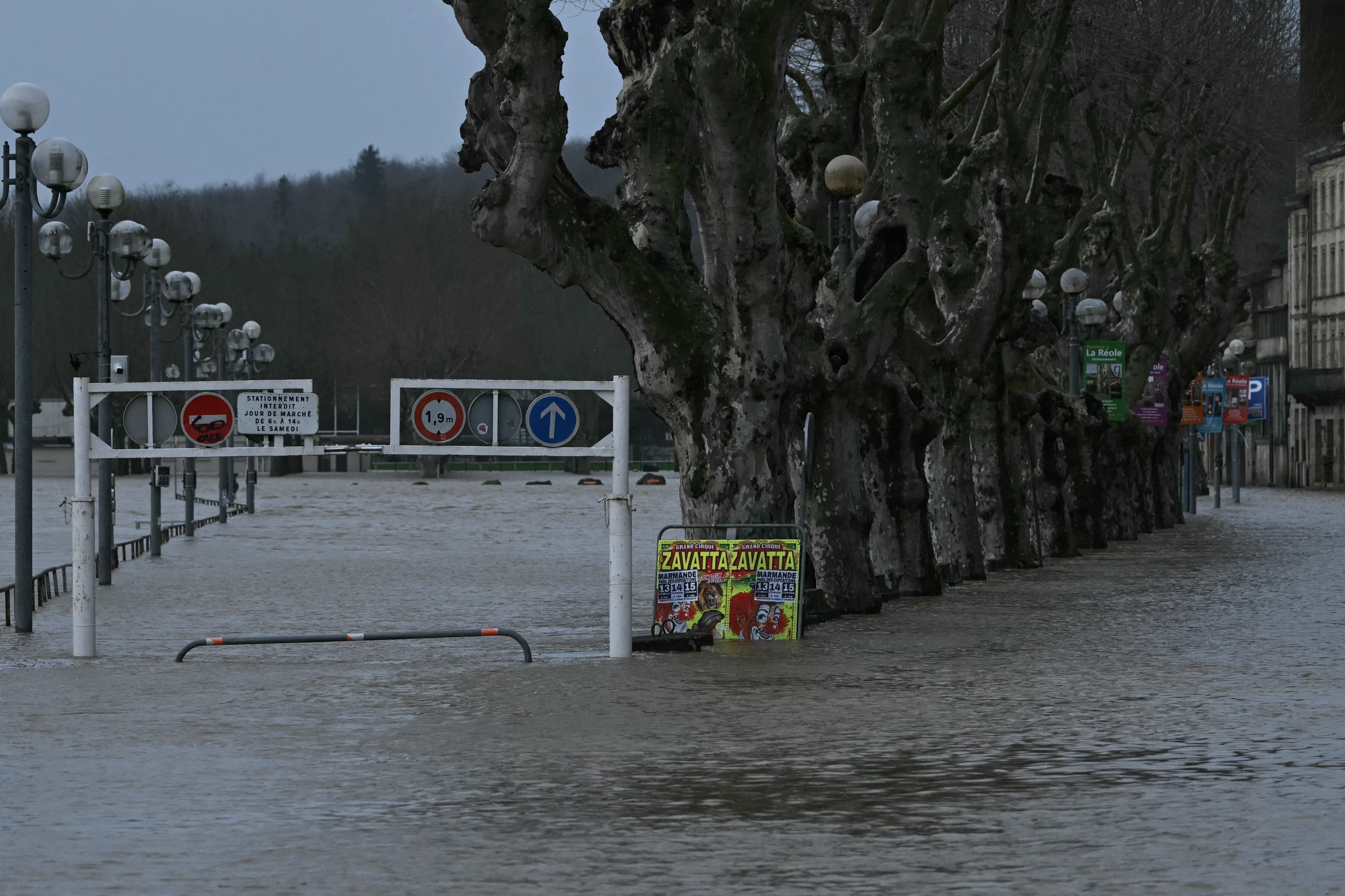 Floodwaters from the swollen Garonne river inundate streets in La Reole, south-western France, on Thursday