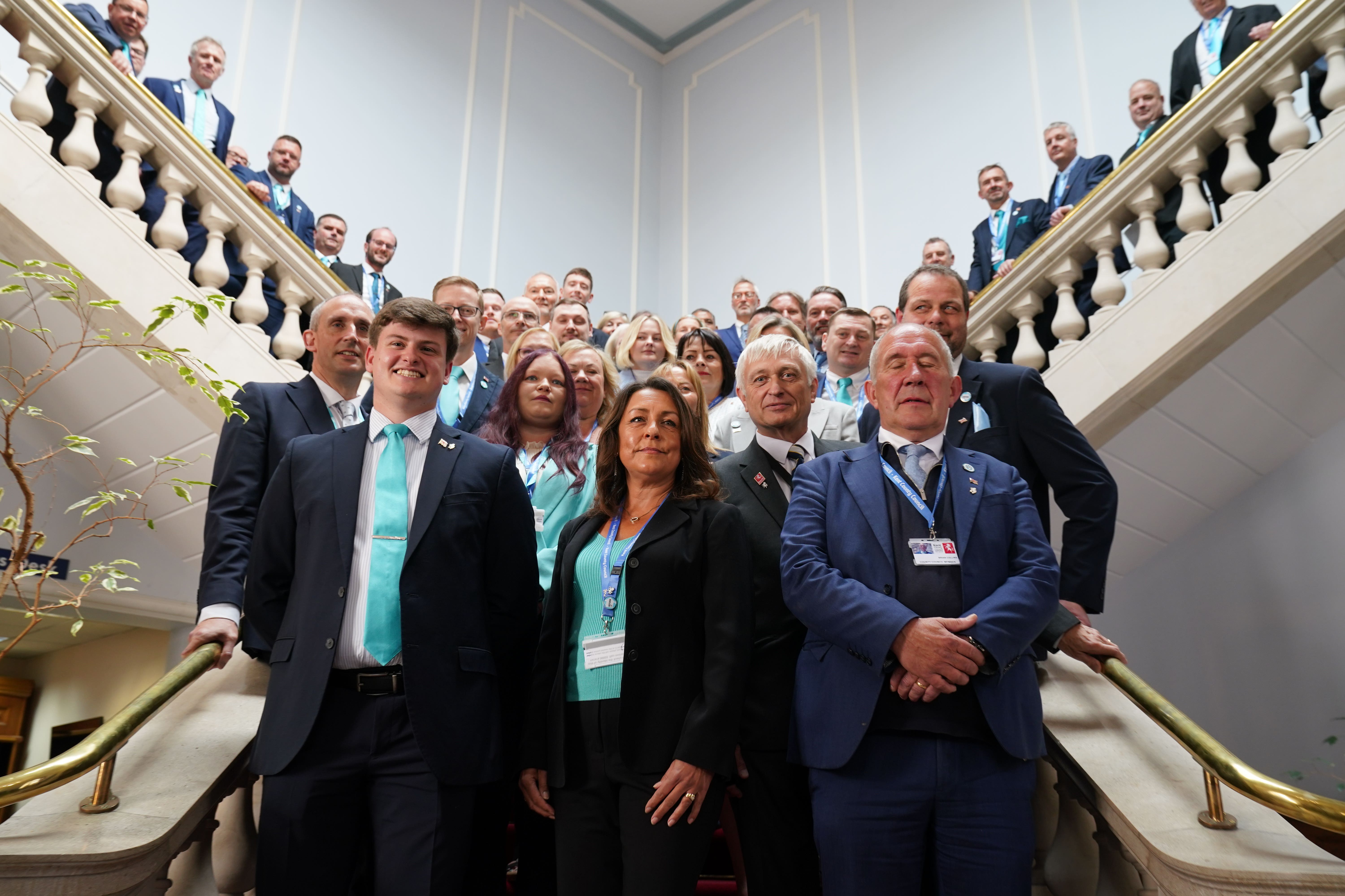 Linden Kemkaran (front centre), leader of the Reform UK on Kent County Council group, with her fellow Reform councillors (Gareth Fuller/PA)