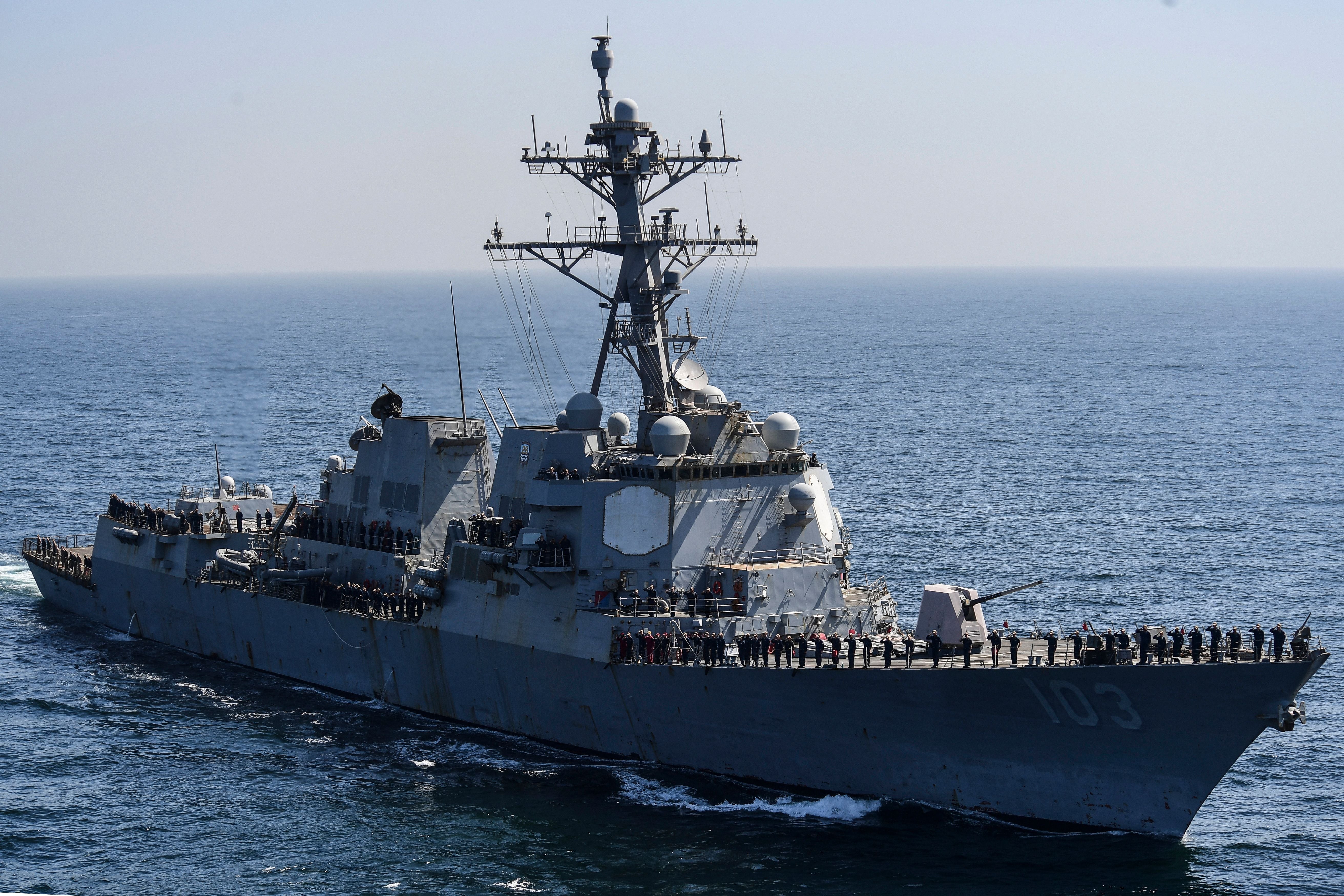 Destroyer USS Truxton (pictured) and a Navy supply ship collided while refueling at sea on Wednesday, leaving two people with minor injuries, according to a report