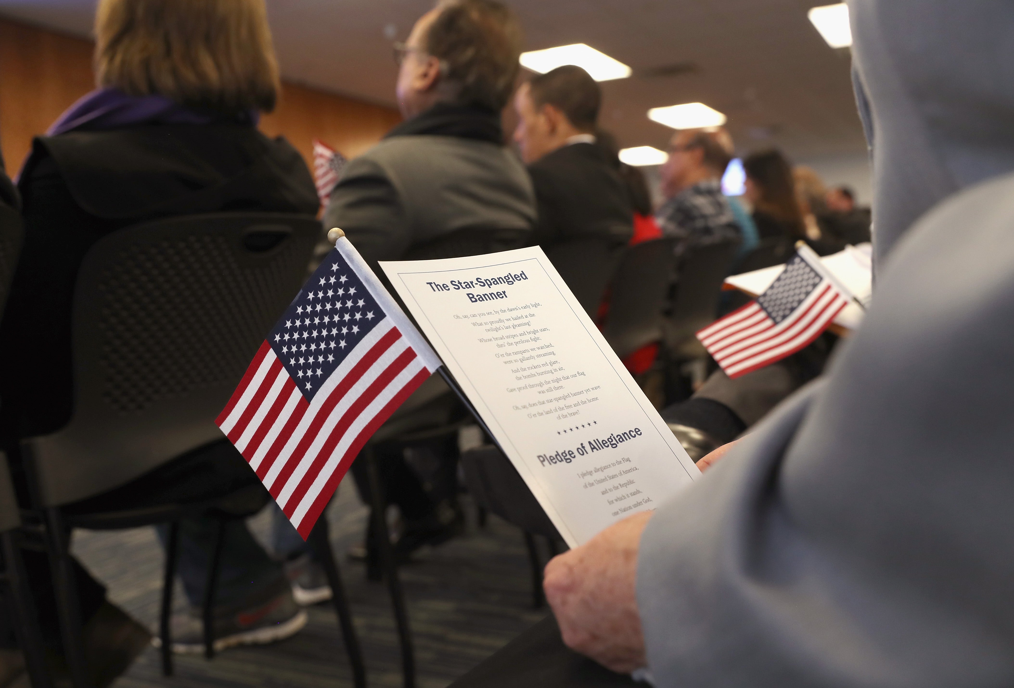 The Trump administration is moving ahead with plans to strip some foreign-born Americans of their citizenship, with a target of 200 cases a month, according to a report