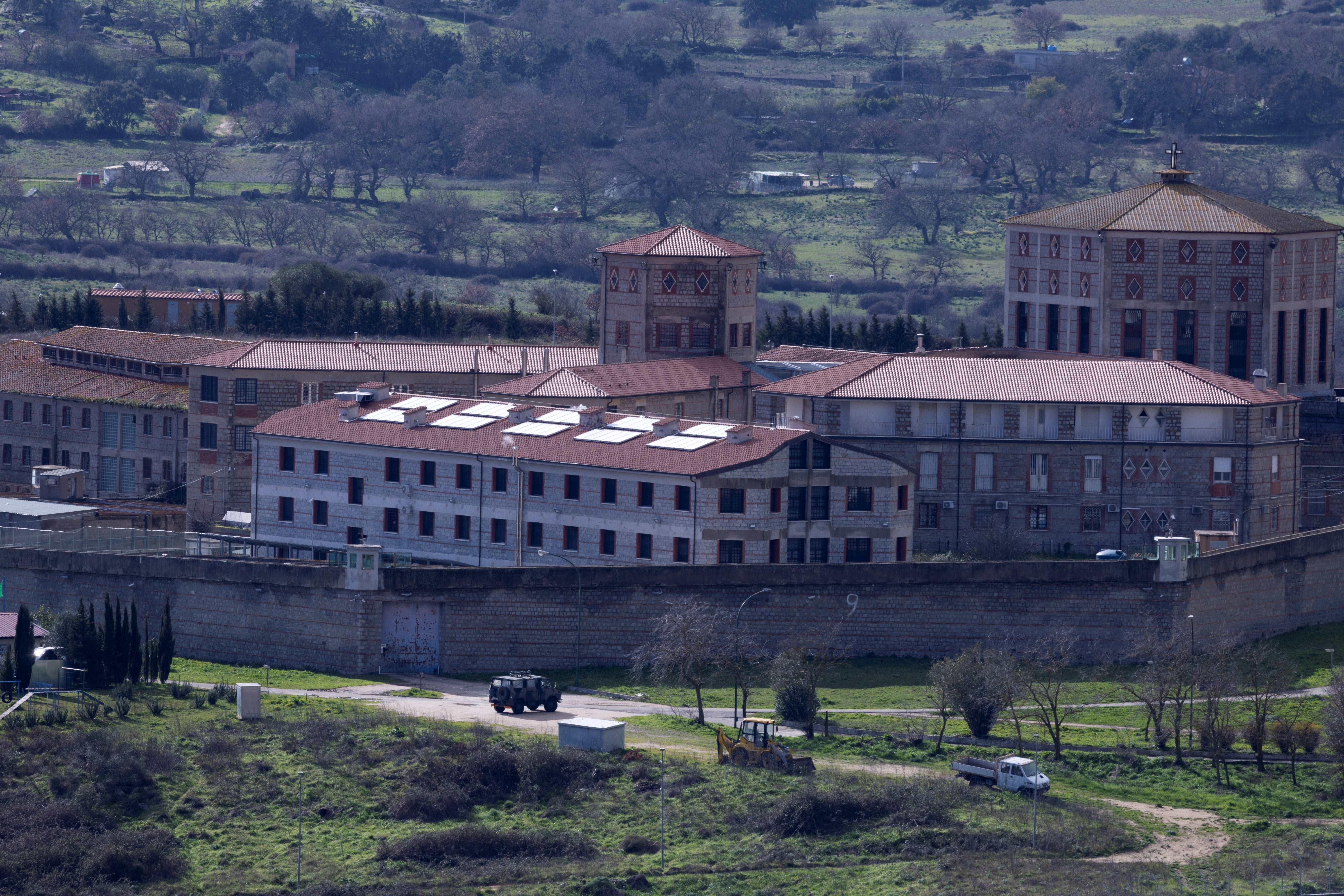 Cars stand parked near the Badu'e Carros prison in Nuoro, Italy