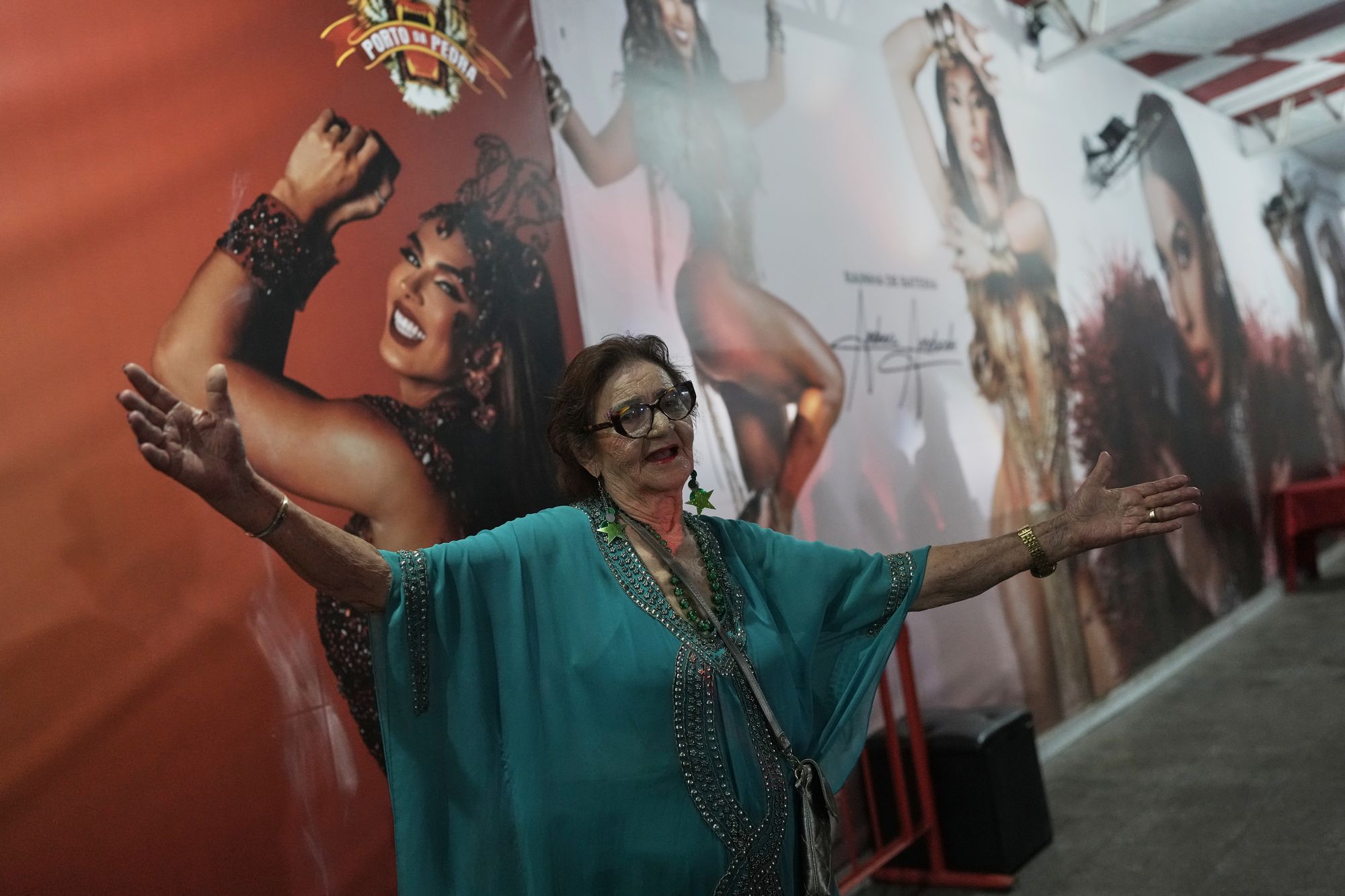 <p>Former sex worker Lourdes Barreto dances during Porto da Pedra samba school's rehearsal for a parade</p>