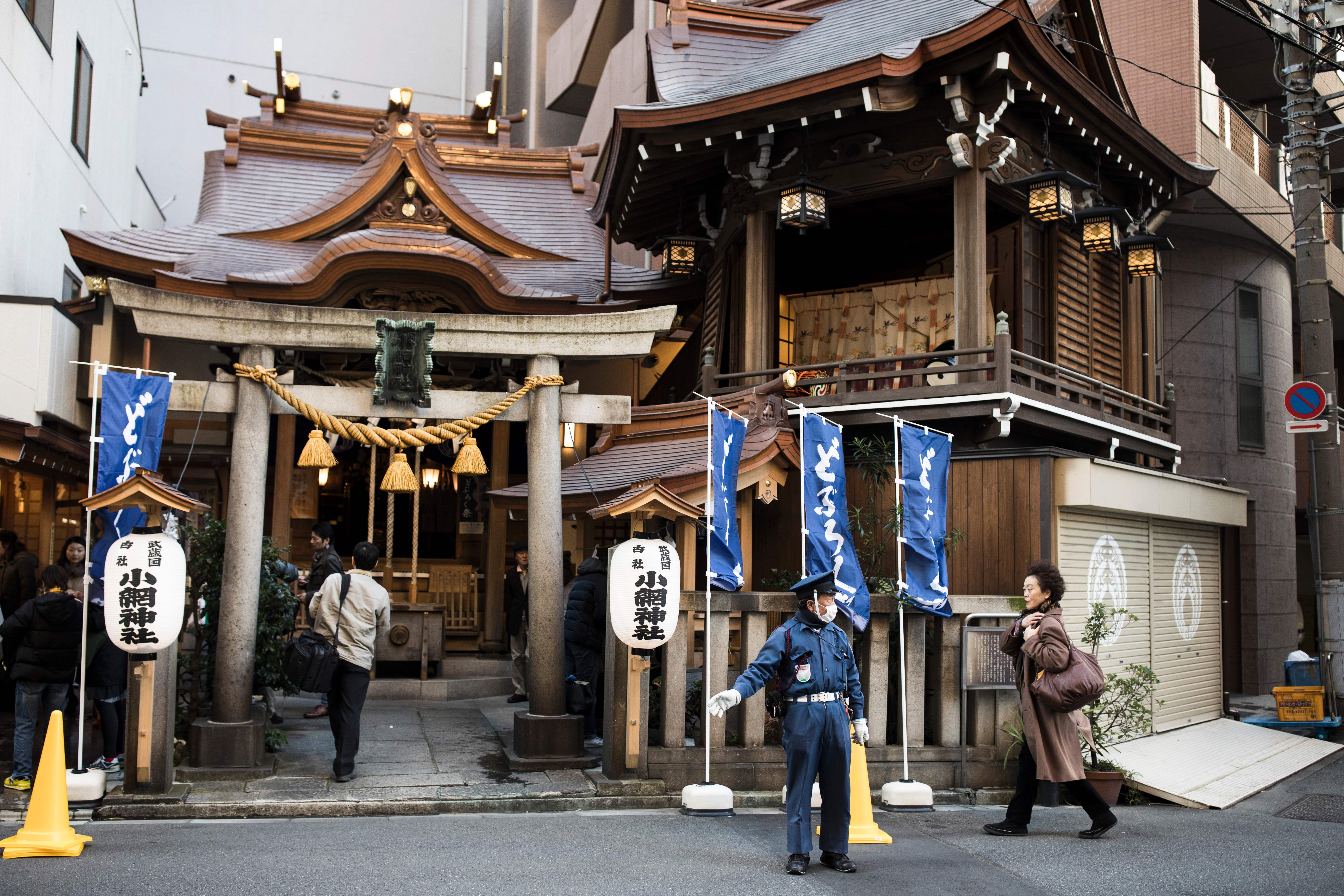 Representative. File image. A guard stands in front of the Koami Shinto shrine in Tokyo, Japan. - An association of Shinto shrines has called on ‘shrines across the country to be vigilant’ as there has been a surge in theft of shrines’ copper roof plates nationwide