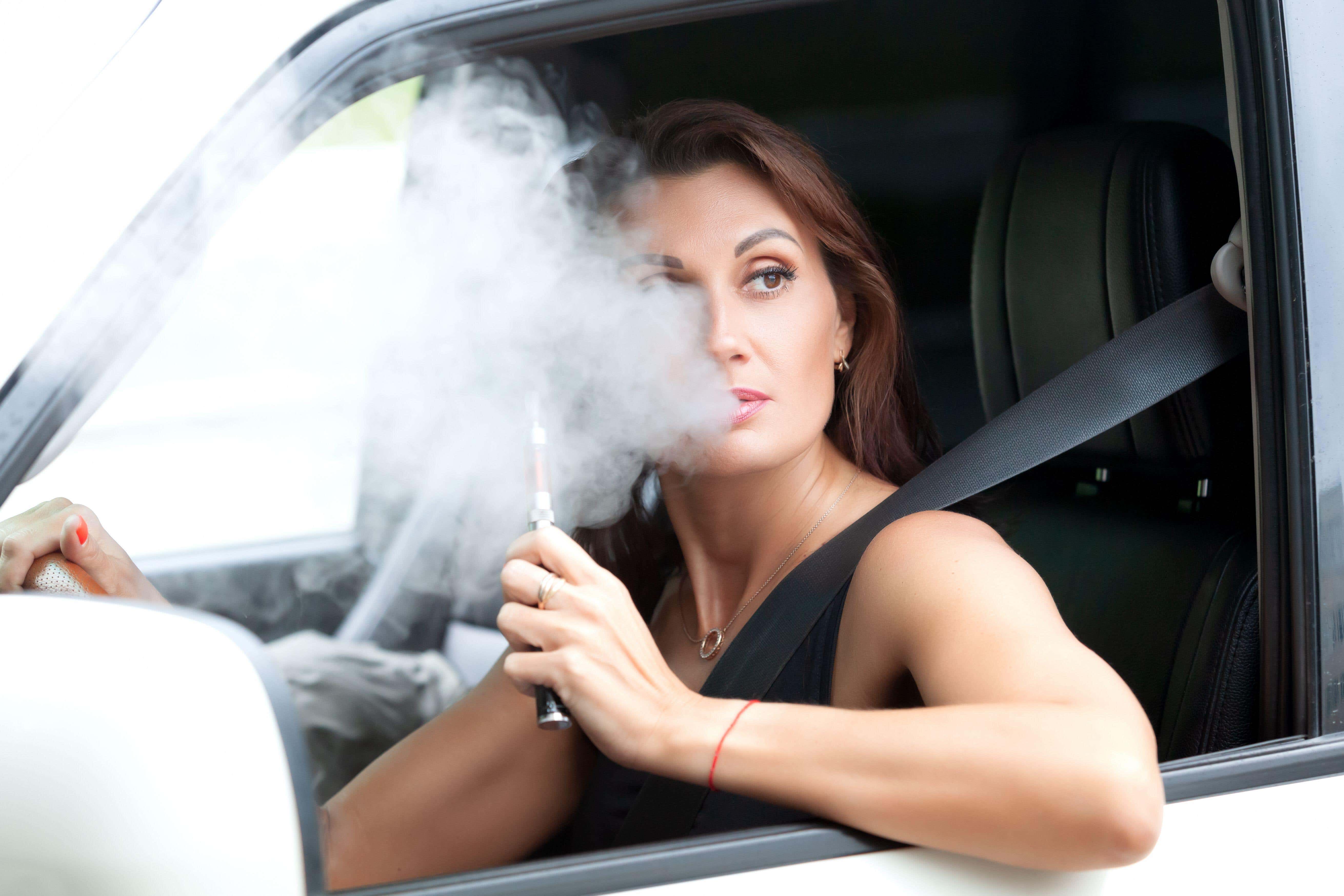 People will be prevented from vaping in cars carrying youngsters, according to the plan, which is subject to consultation (Alamy/PA)