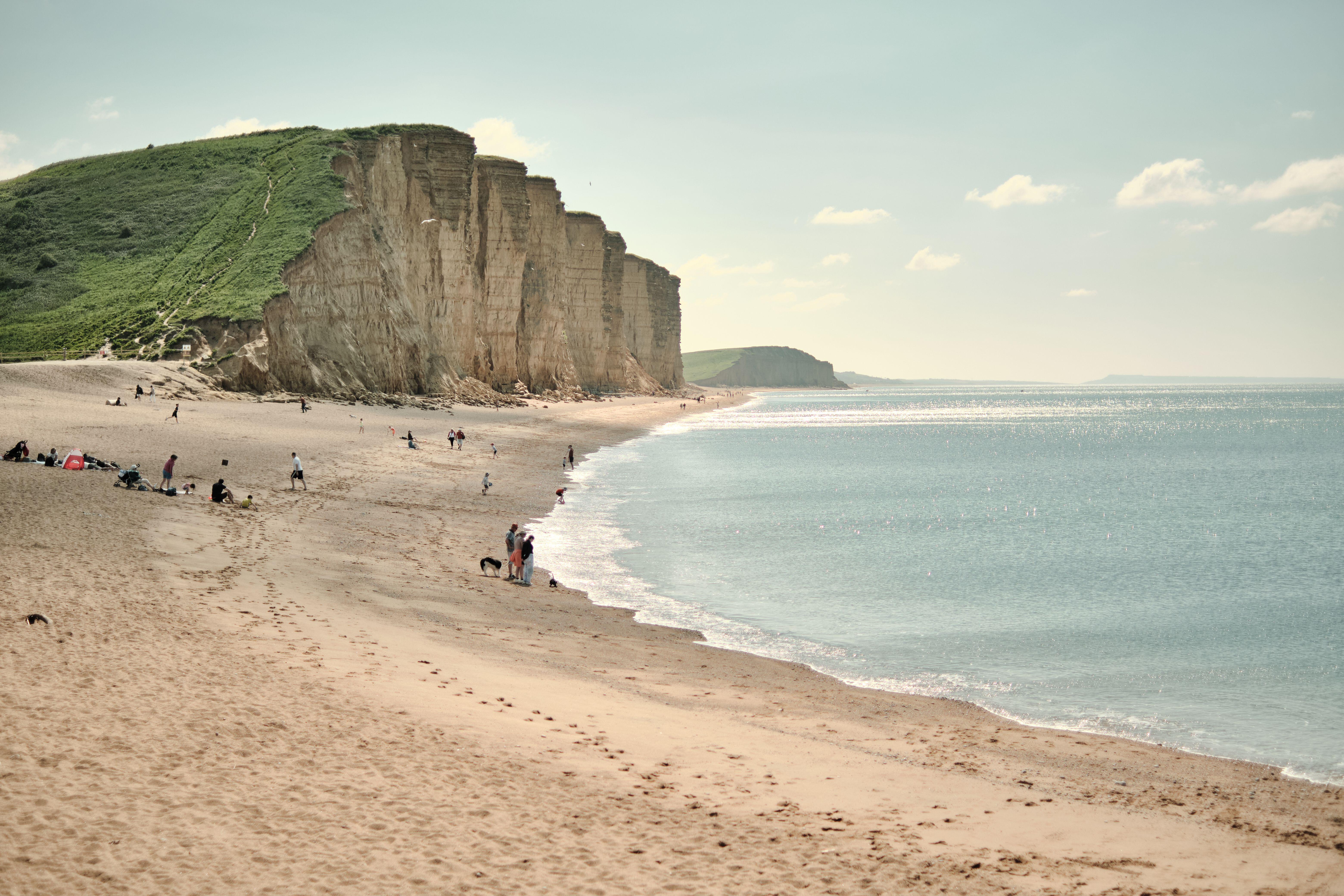 People on East Beach in Dorsey (Alamy/PA)