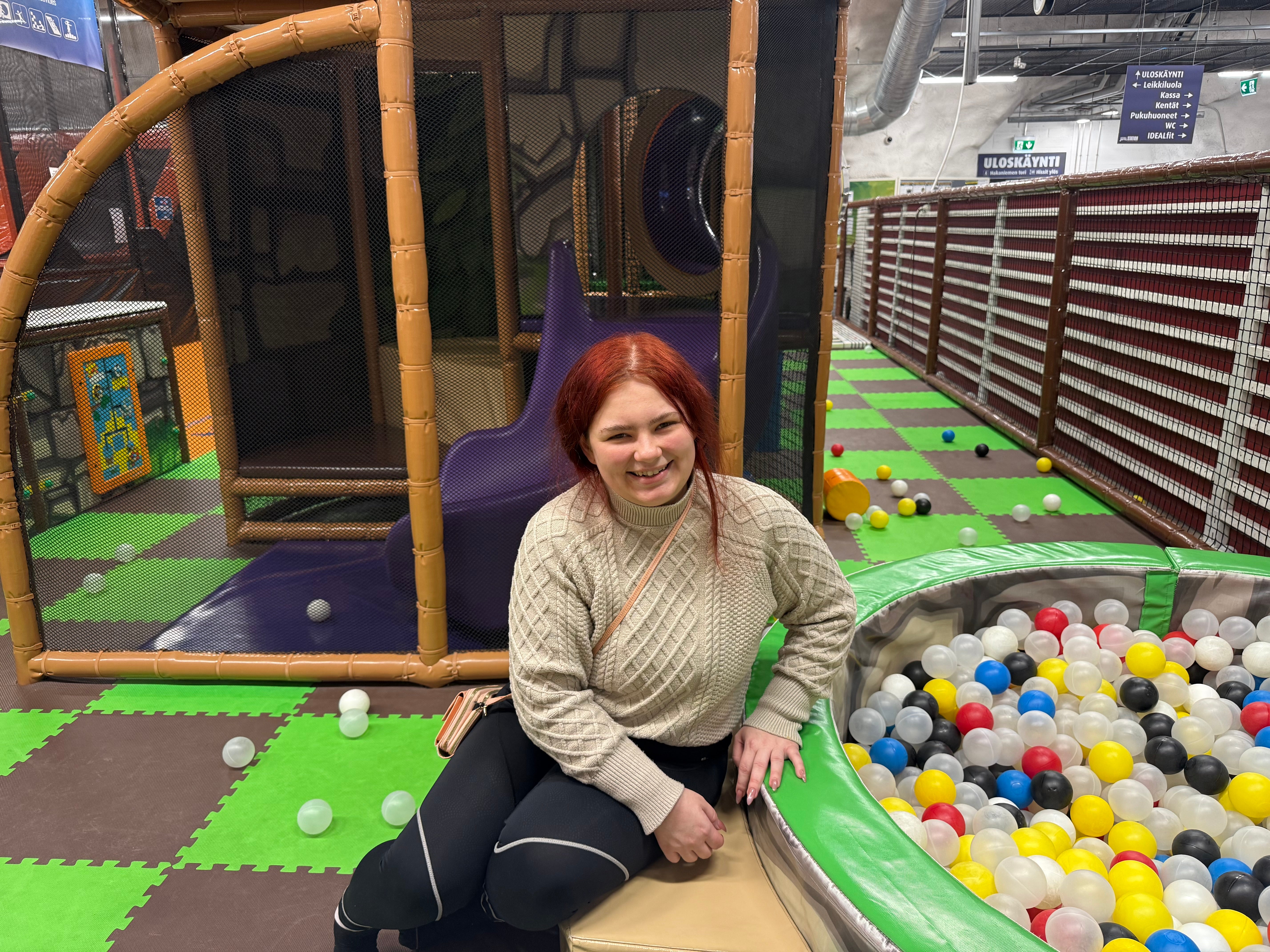 Rebecca Harkonen takes her two little boys to the children’s play area that currently occupies part of the bunker