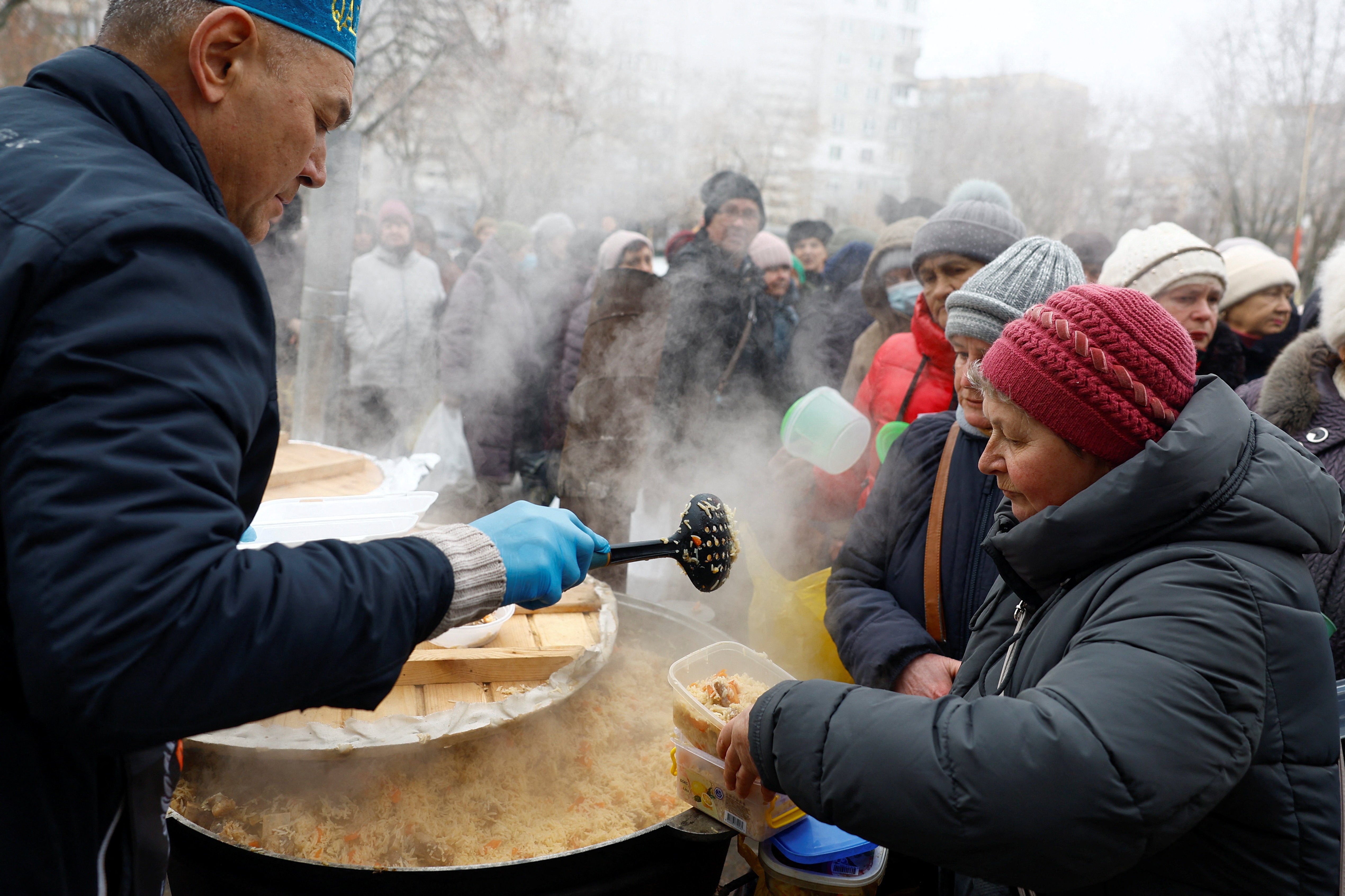 Residents cope with electricity, heating and water outages following Russian attacks on Ukraine's infrastructure in Kyiv