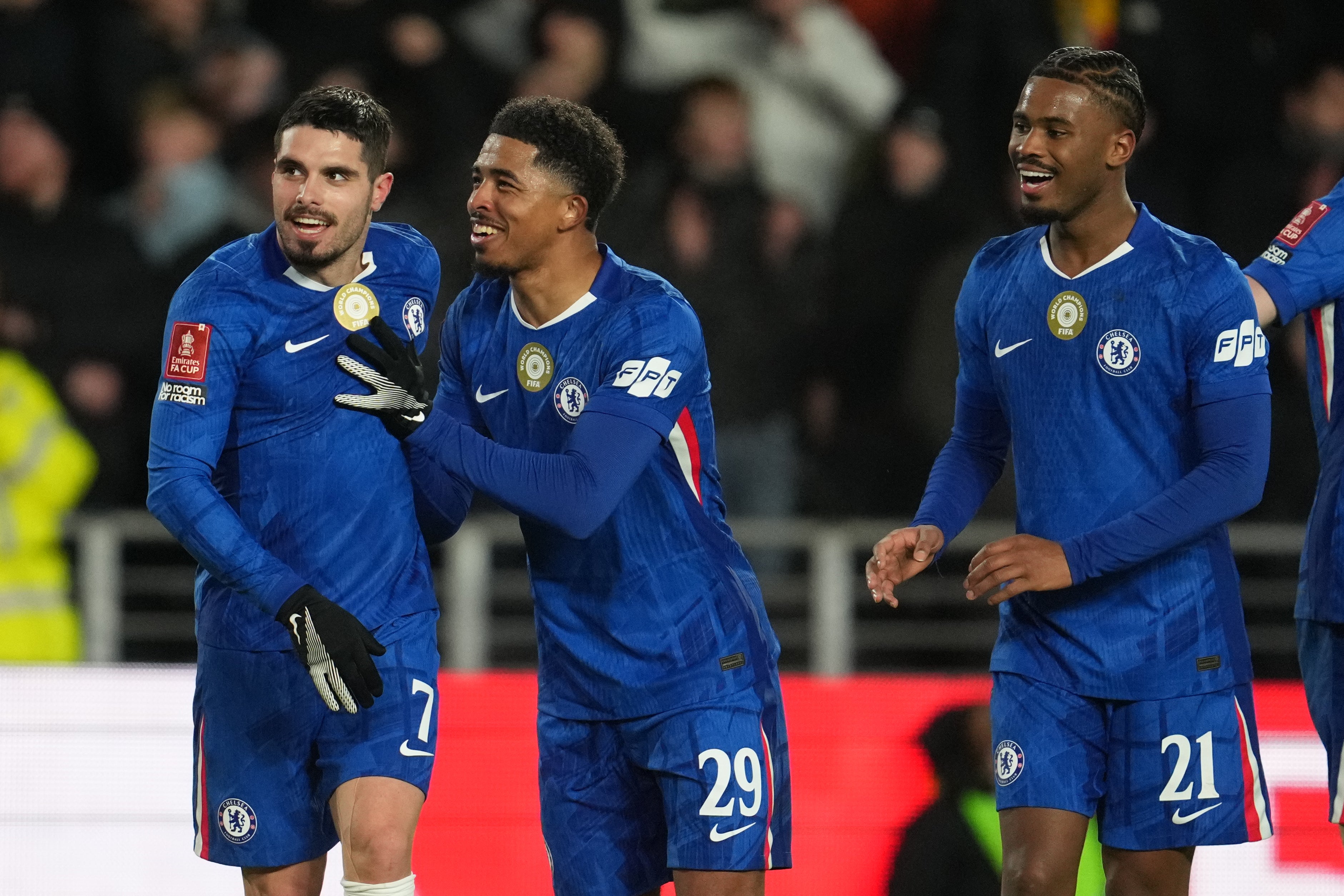 Chelsea's Pedro Neto, left, Wesley Fofana celebrate at Hull