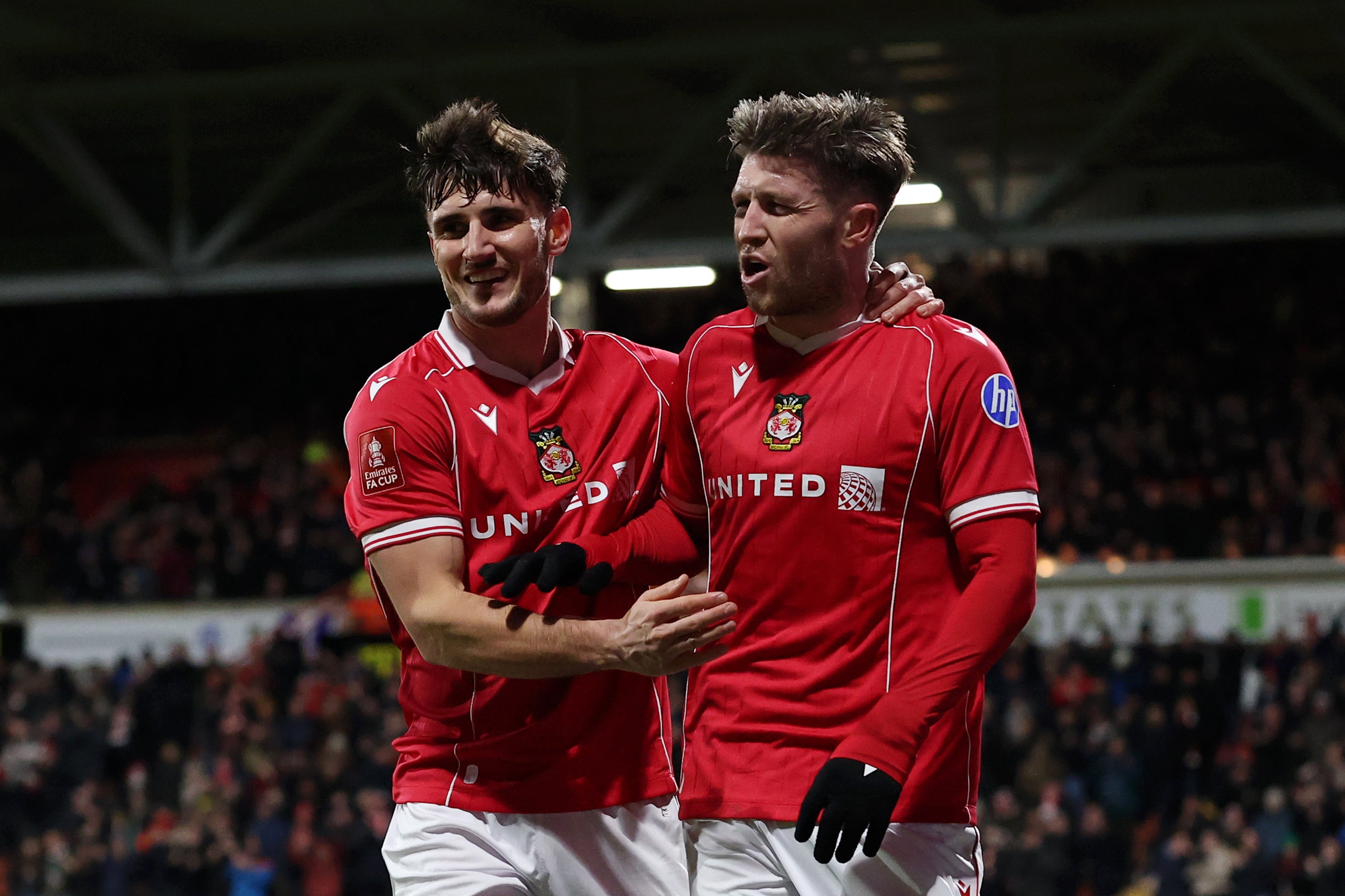 Josh Windass of Wrexham celebrates after scoring