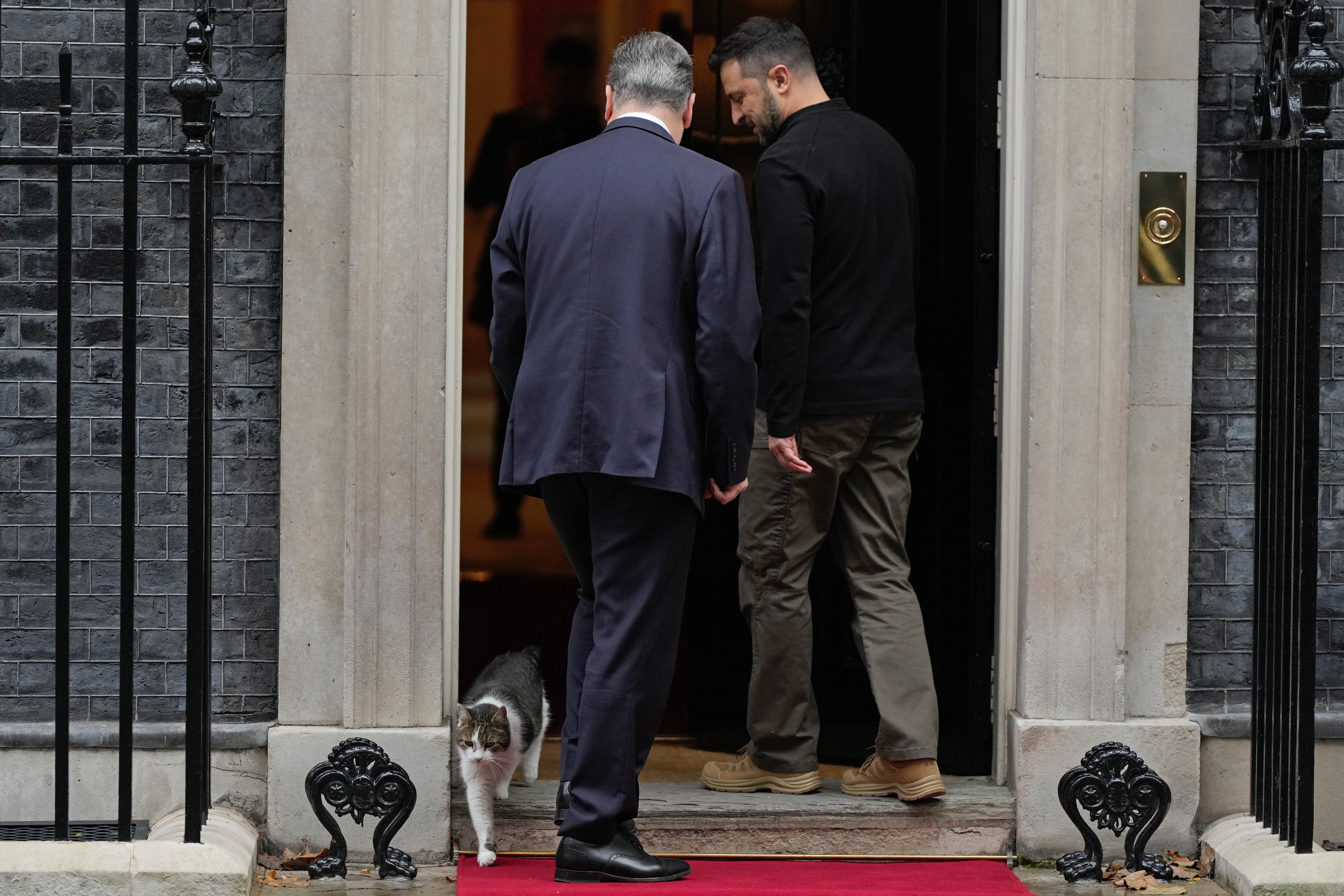 Britain’s Prime Minister Keir Starmer welcomes Ukrainian President Volodymyr Zelenskyy to 10 Downing Street as Larry the Cat steps out