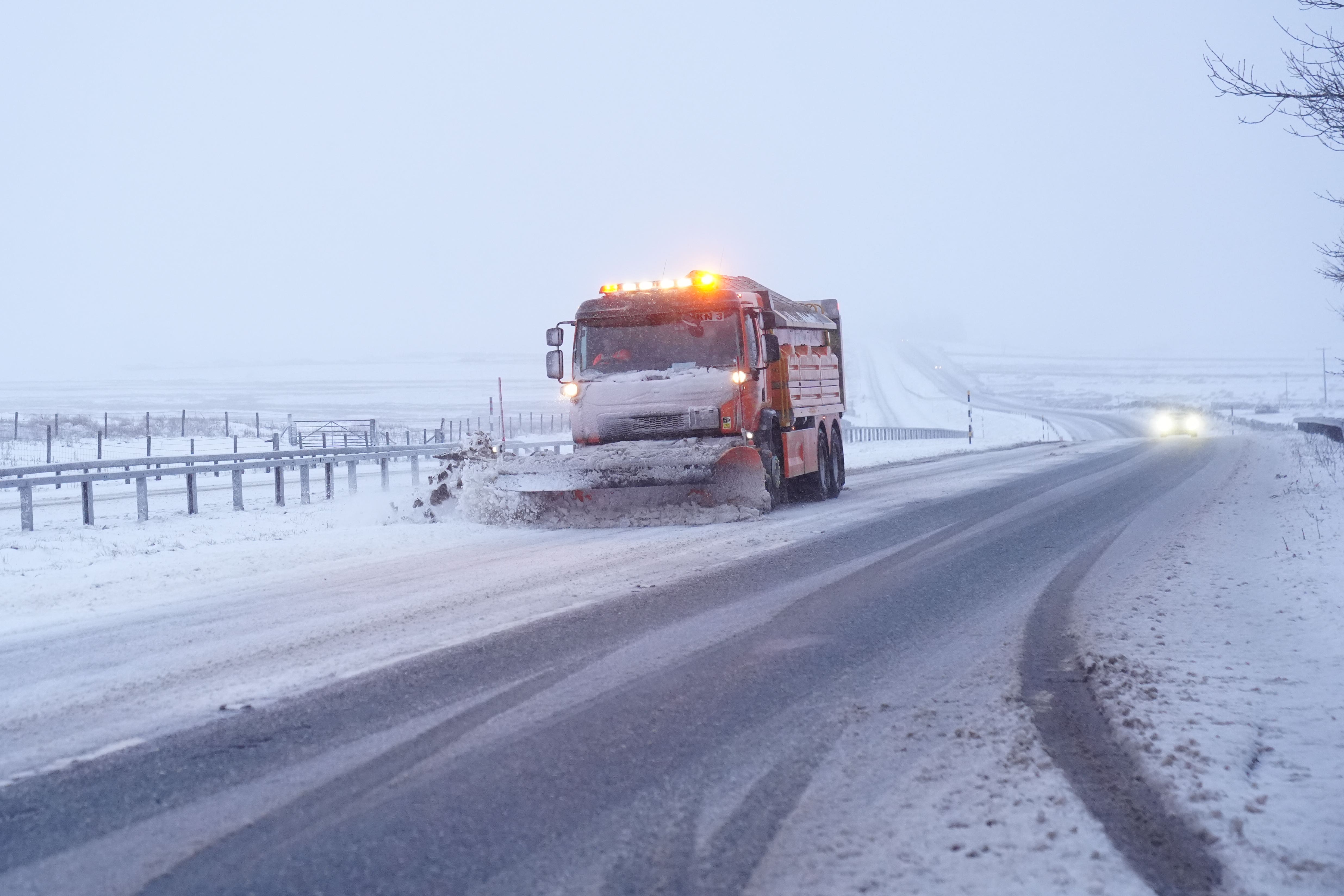 Snow warnings are in place in large parts of the UK (Owen Humphreys/PA)