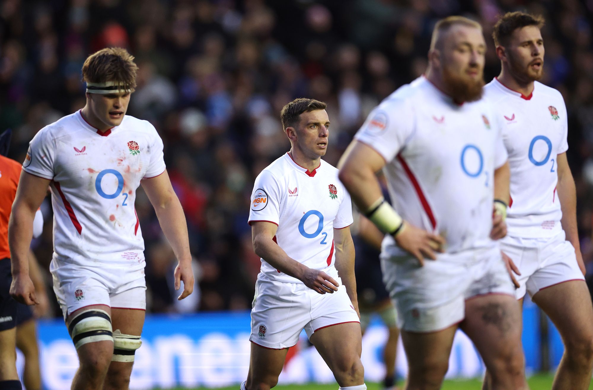 George Ford of England (centre) reacts after the third Scotland try at Scottish Gas Murrayfield